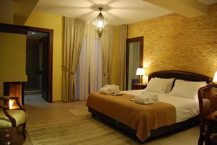 Bed in Agapi Luxury Hotel