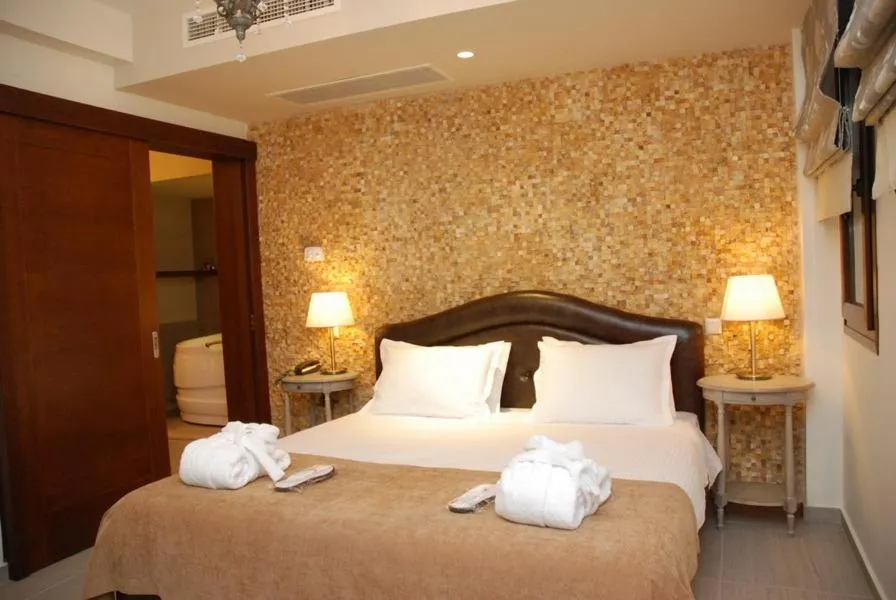 Bed in Agapi Luxury Hotel