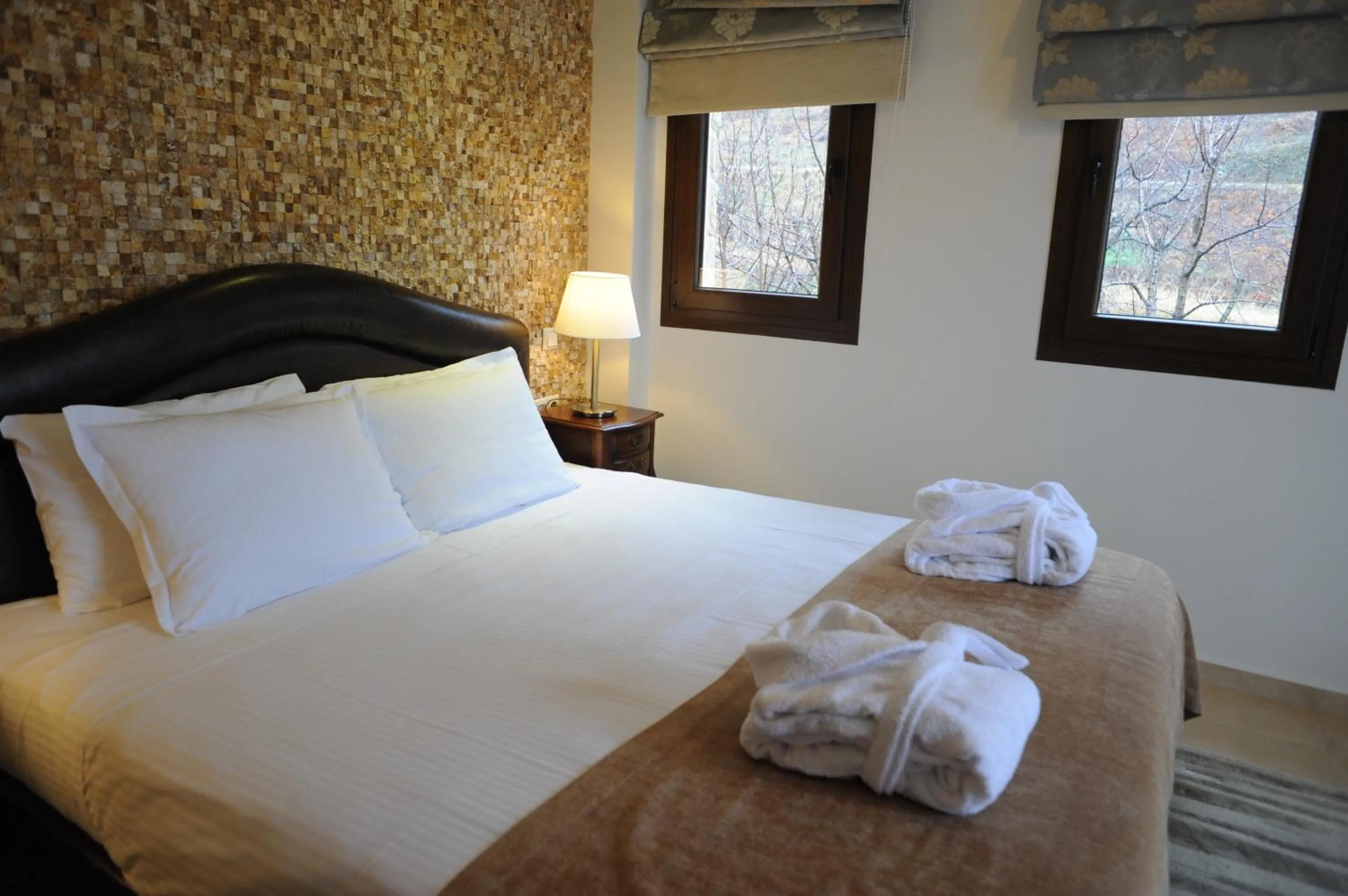 Bed in Agapi Luxury Hotel