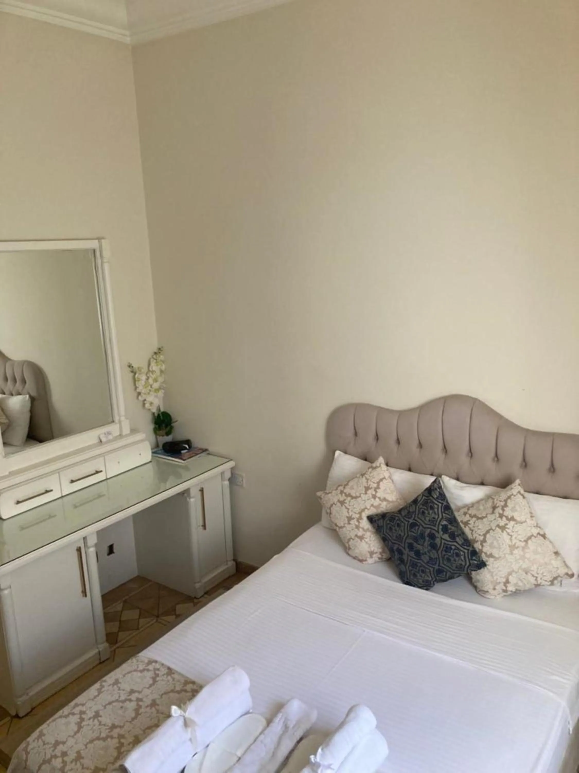 Bed in Lord's Residence Boutique Hotel