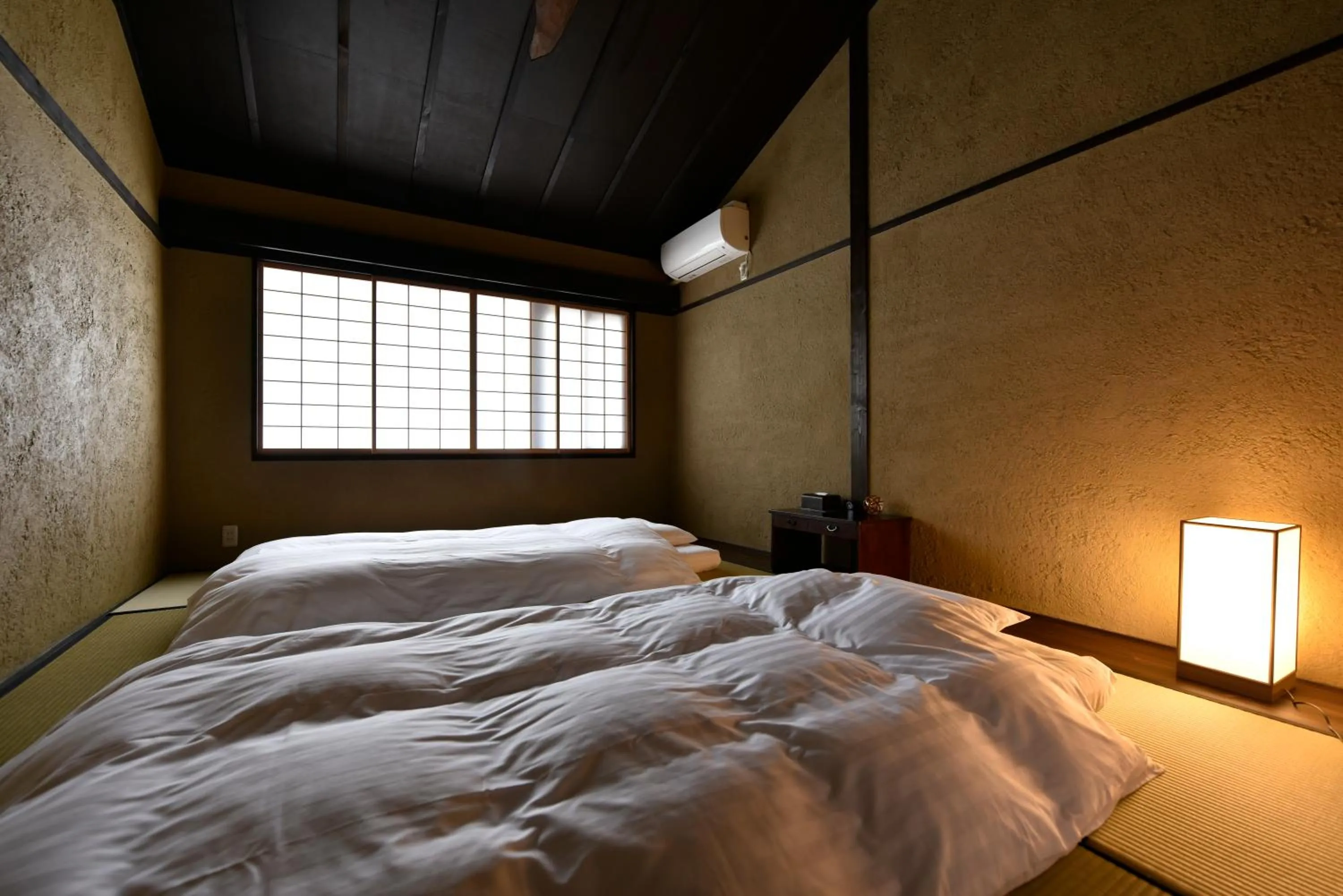 Bed in Rinn Premium Machiya Kunpu