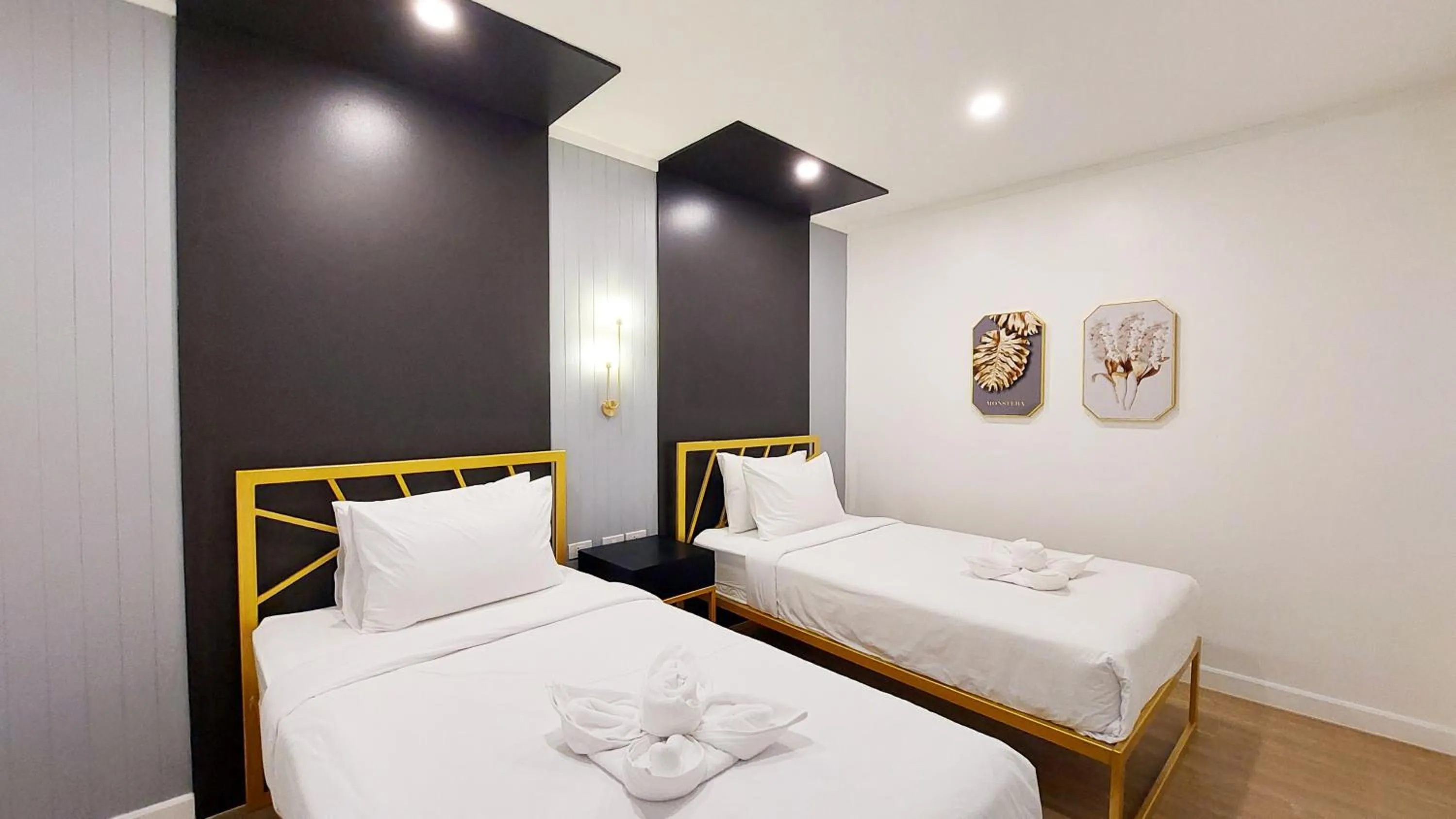 Bed in Raya Buri Resort Kanchanaburi