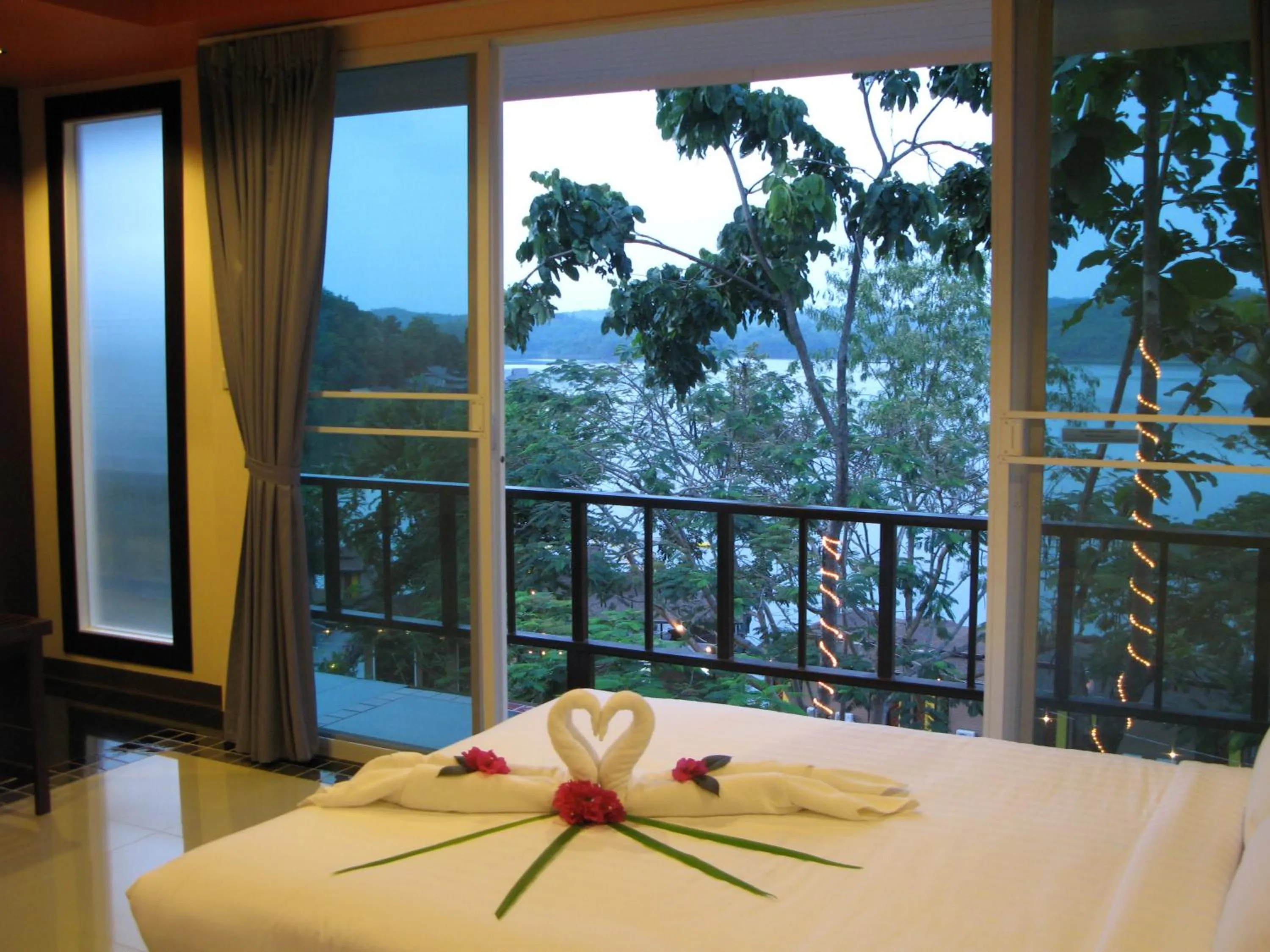 Photo of the whole room, Bed in Raya Buri Resort Kanchanaburi