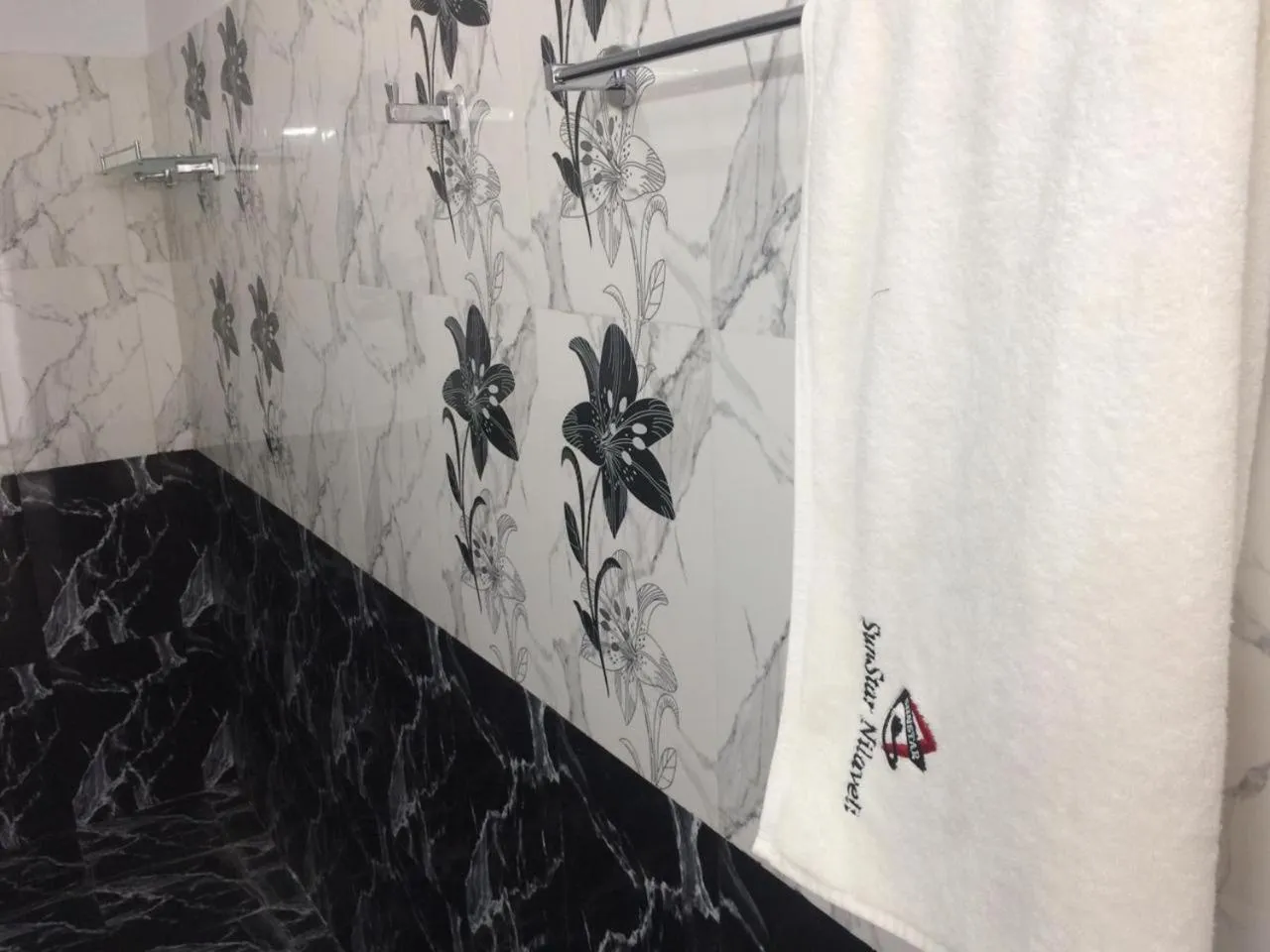 Property logo or sign in Sunstar Nilaveli