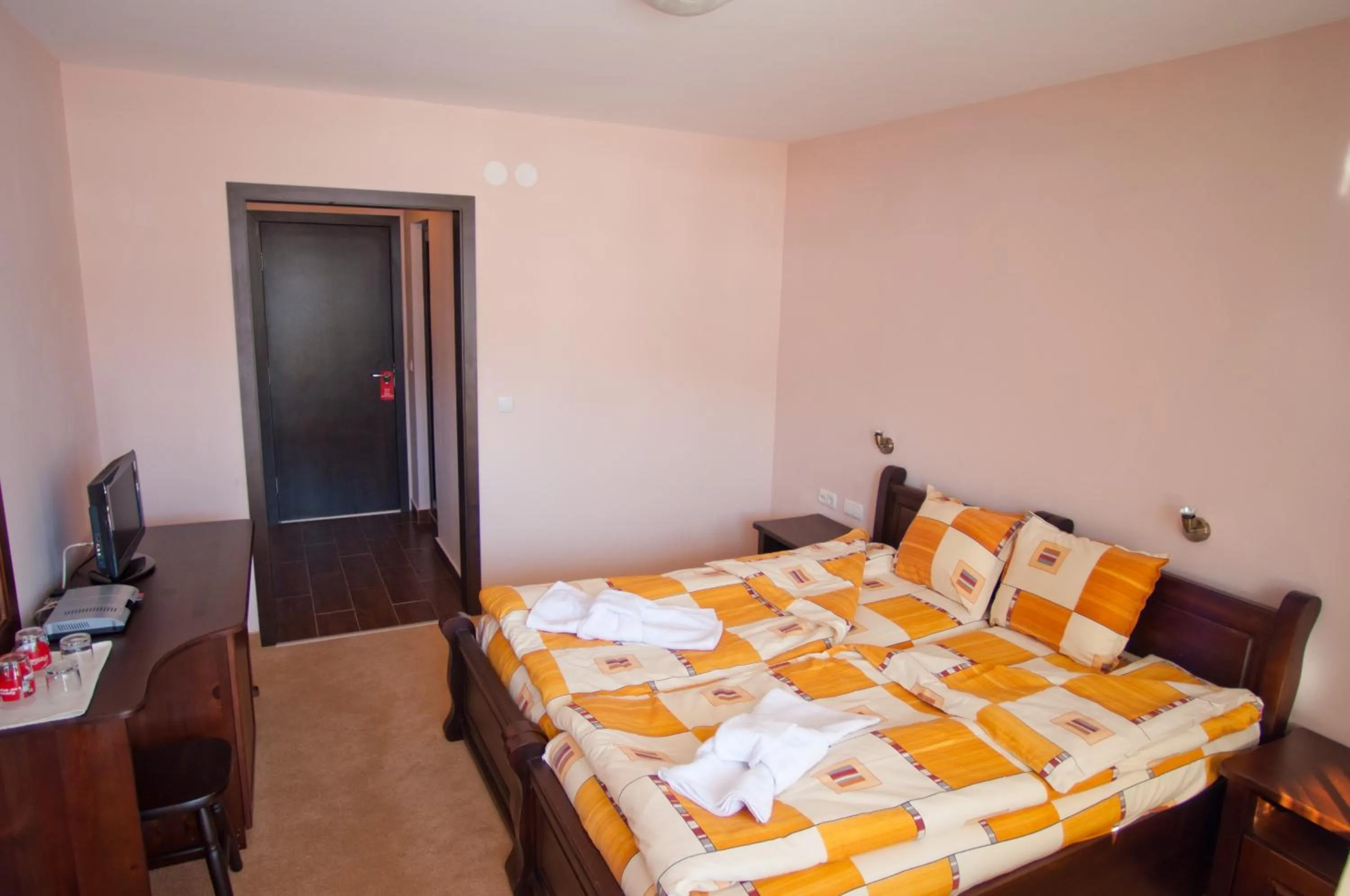 Photo of the whole room, Bed in Family hotel Iskar