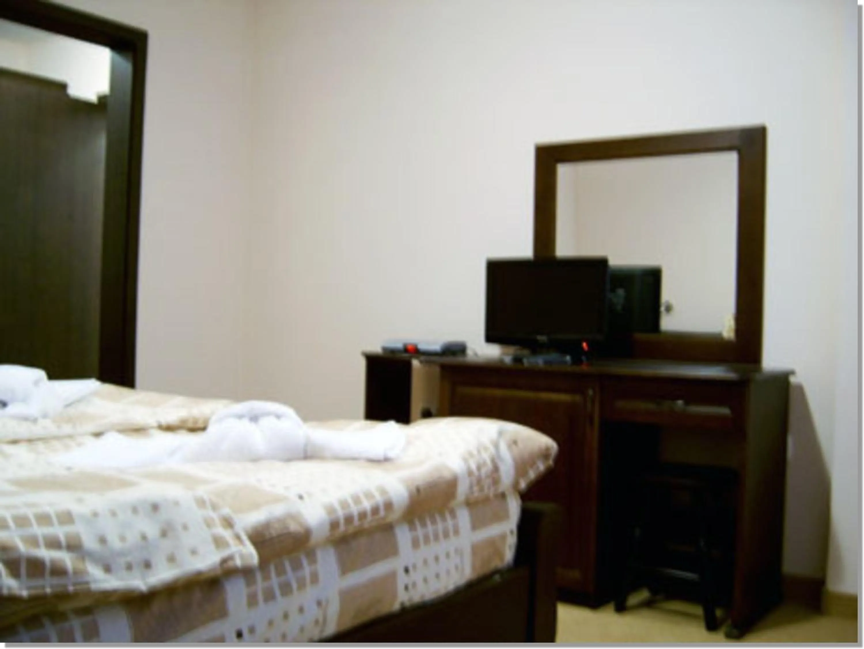 Photo of the whole room, Bed in Family hotel Iskar