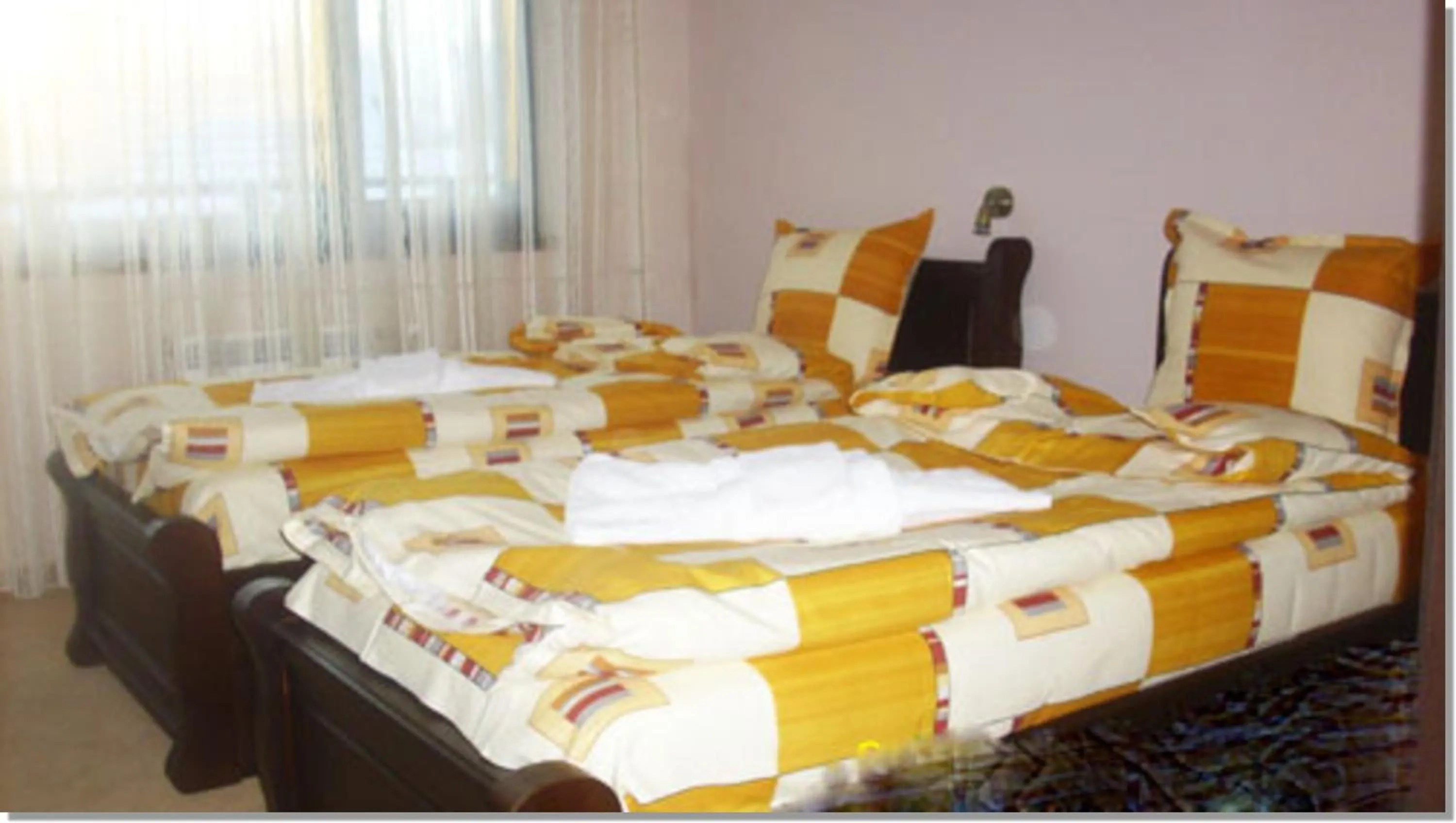 Photo of the whole room, Bed in Family hotel Iskar