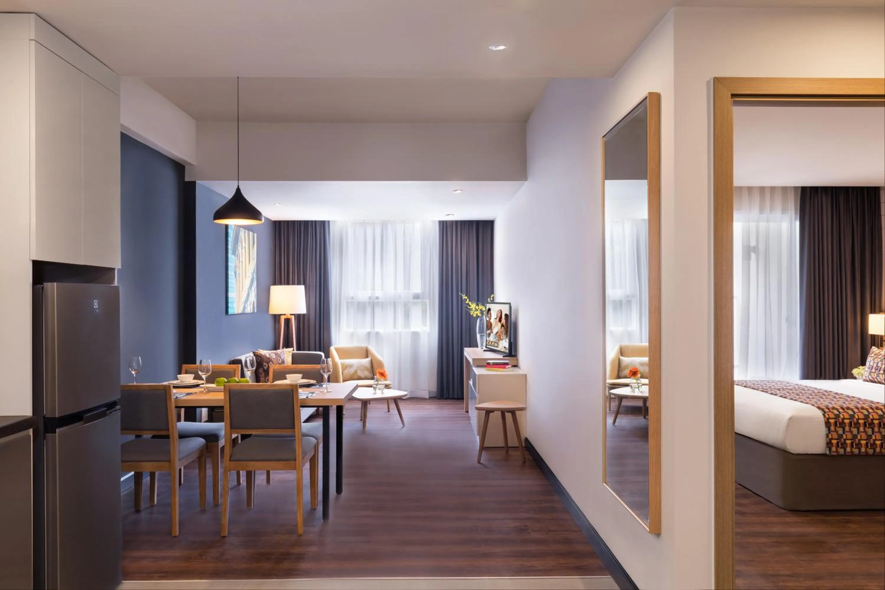 Living room, Bed in Citadines Central Binh Duong