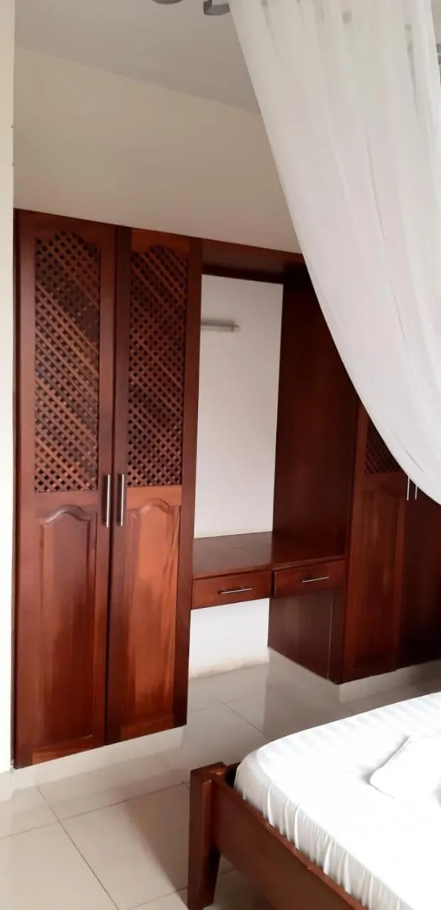 Bed in Nightingale Apartments Hotel Mombasa