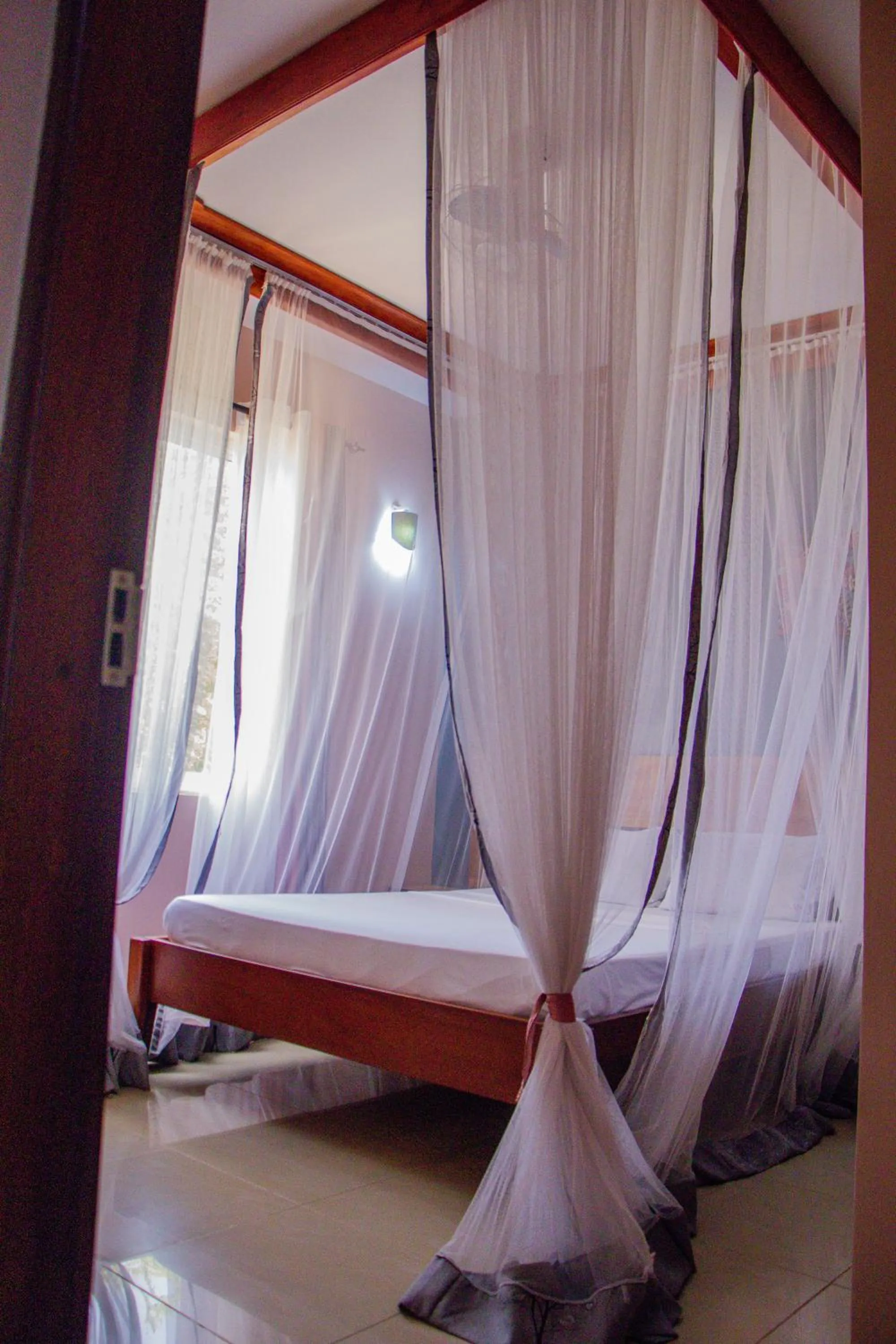 Bed in Nightingale Apartments Hotel Mombasa