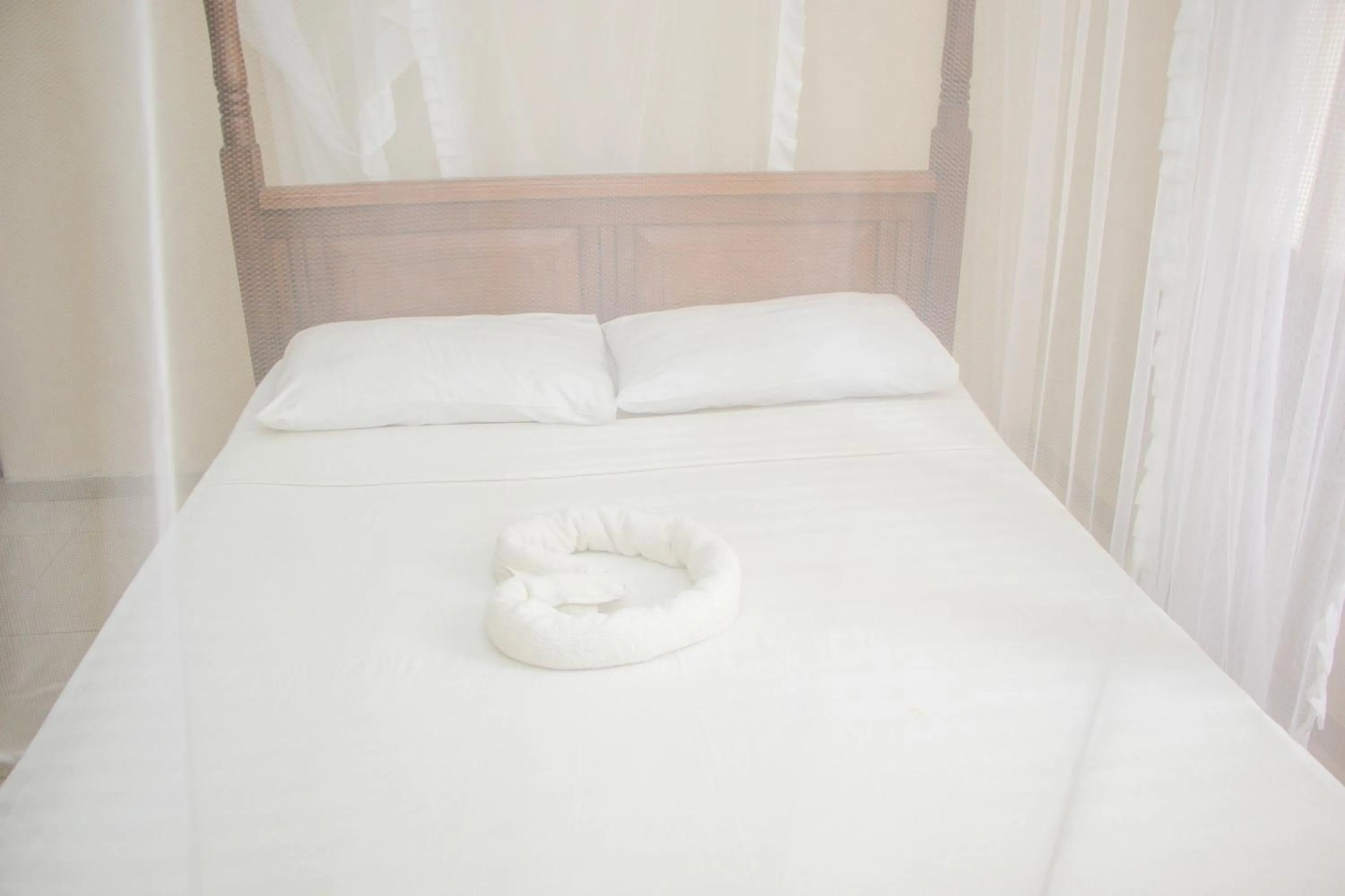 Bed in Nightingale Apartments Hotel Mombasa