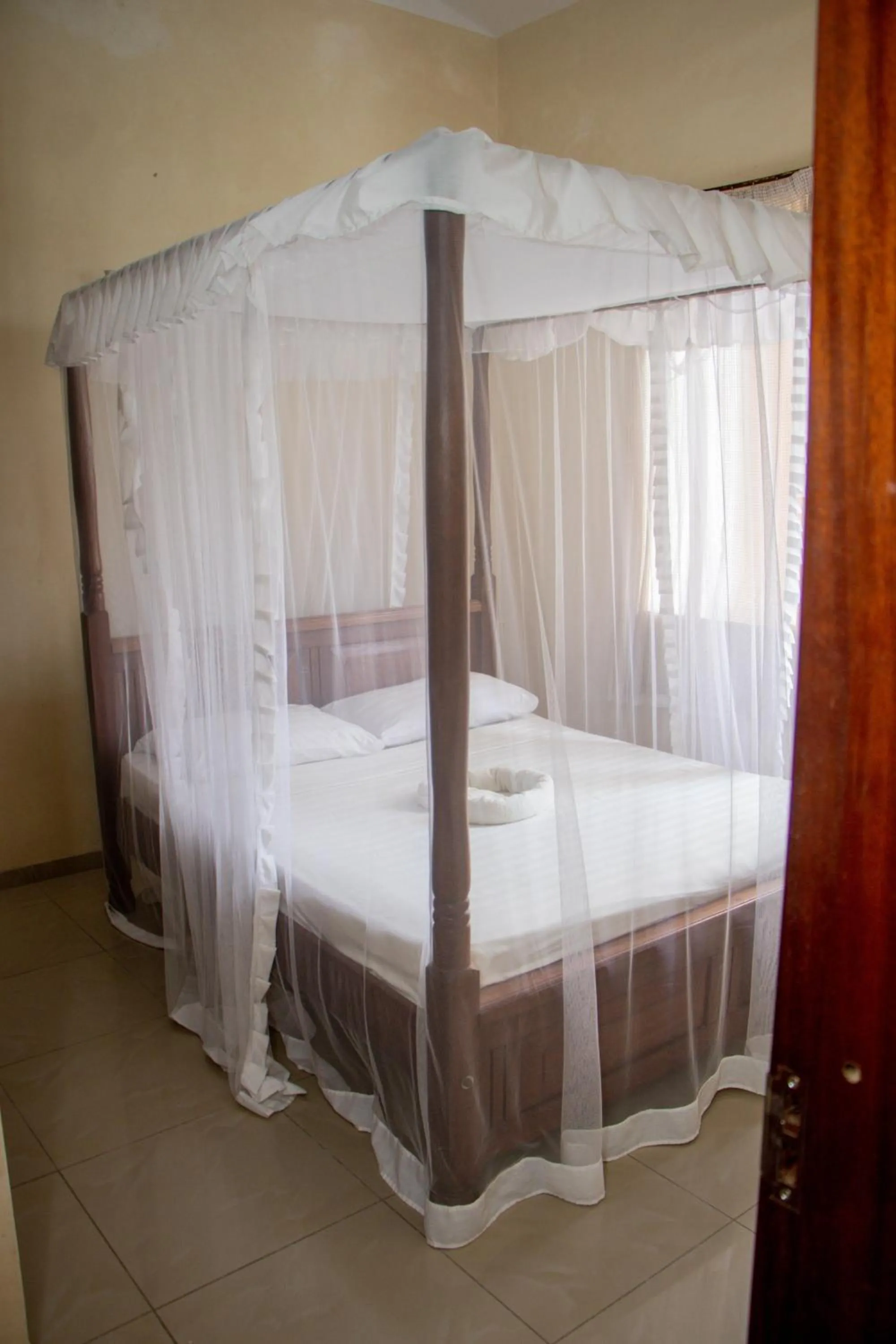 Bed in Nightingale Apartments Hotel Mombasa