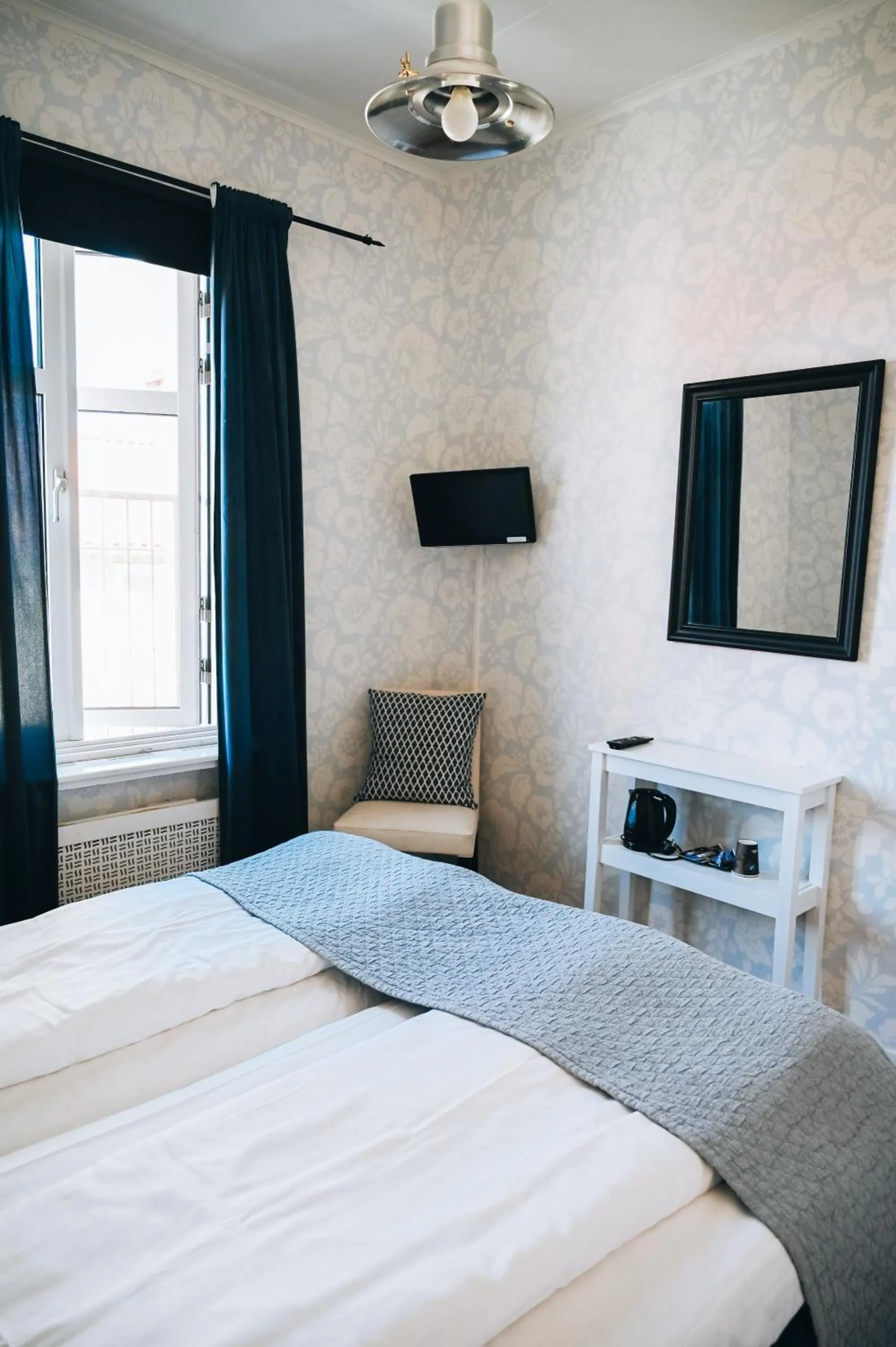 Bed in Nautic Hotell