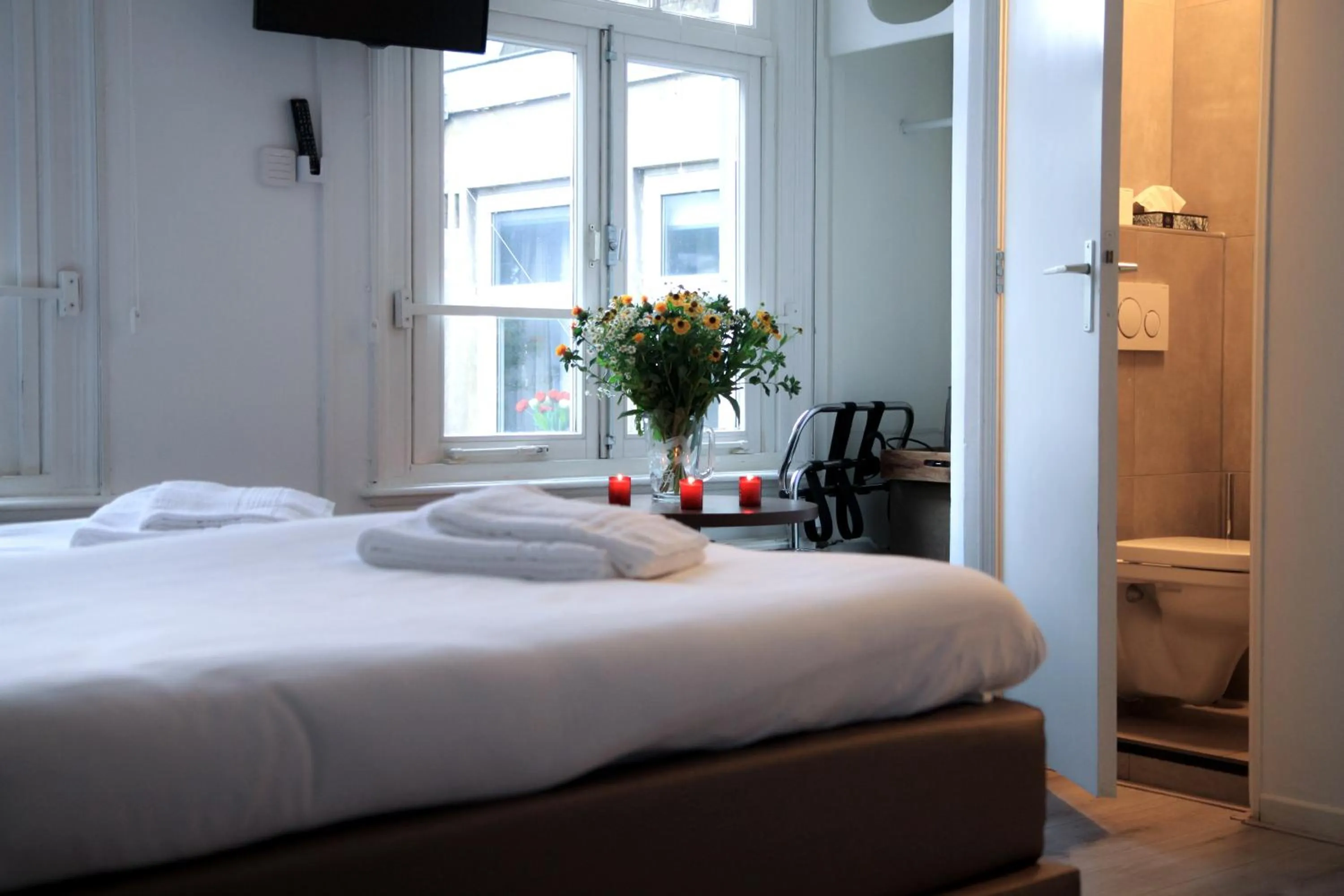 Photo of the whole room, Bed in Hotel 55 - City Centre