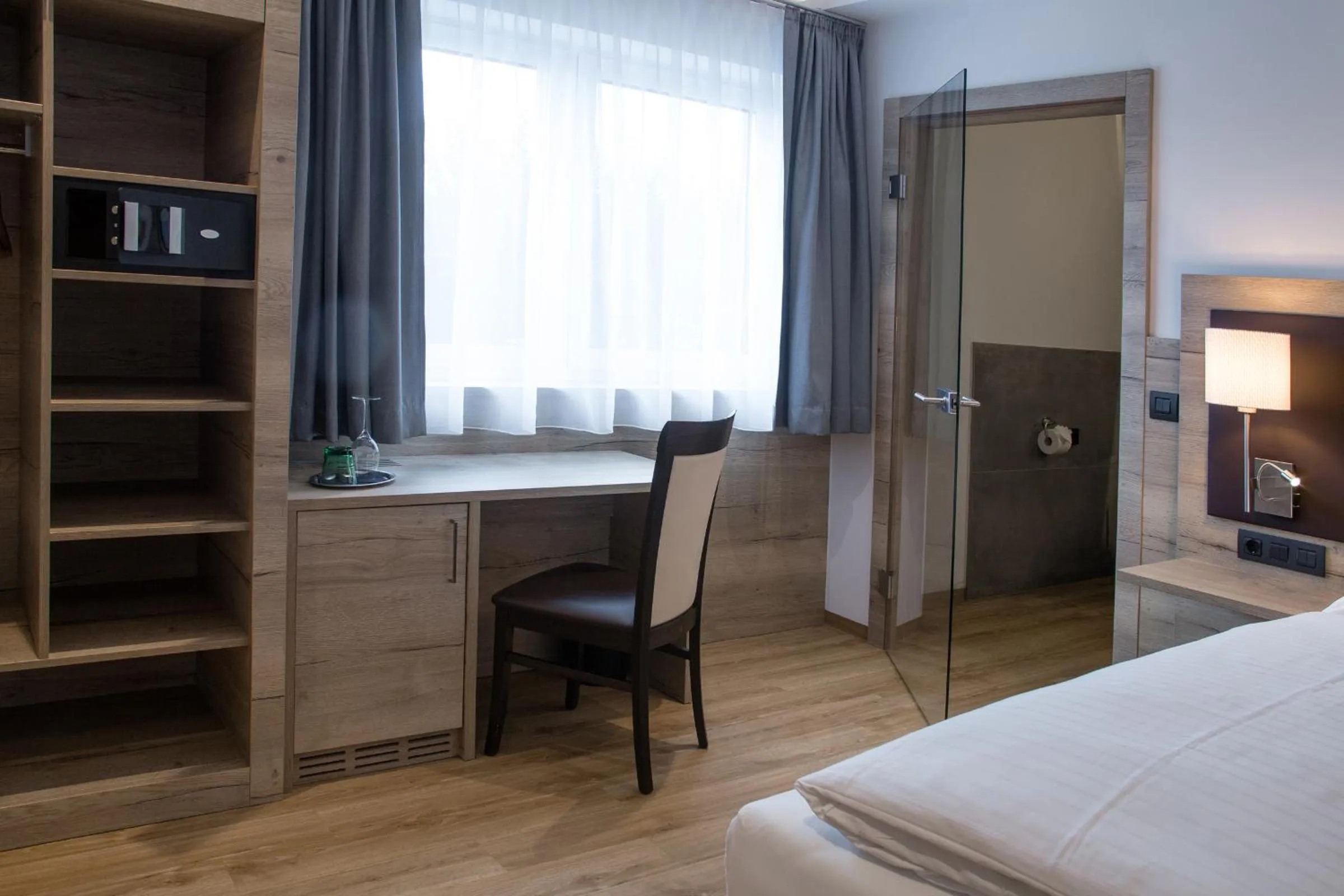 Seating area, Bed in Patrix Hotel, Restaurant, Bar