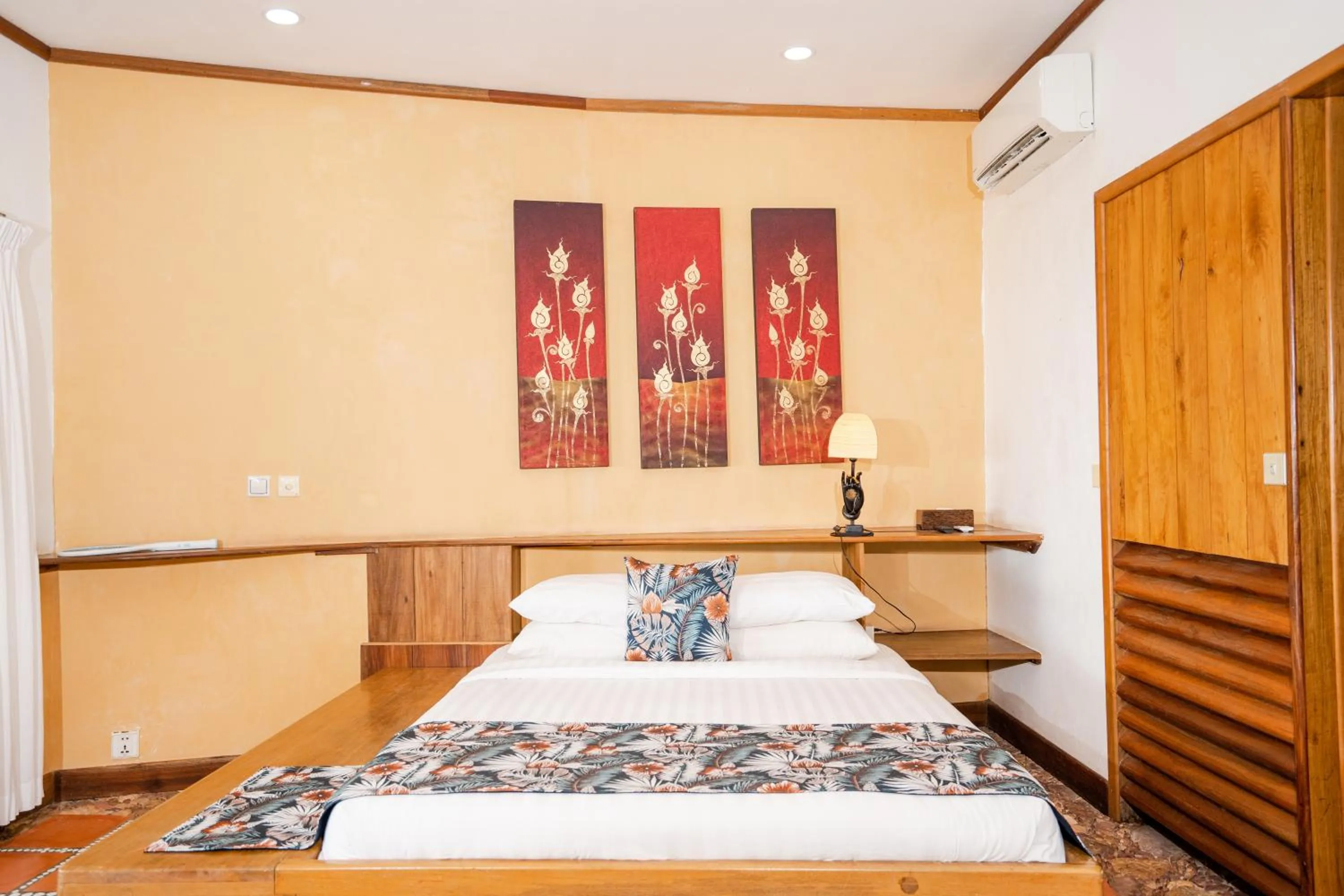 Bed in Veranda Natural Resort