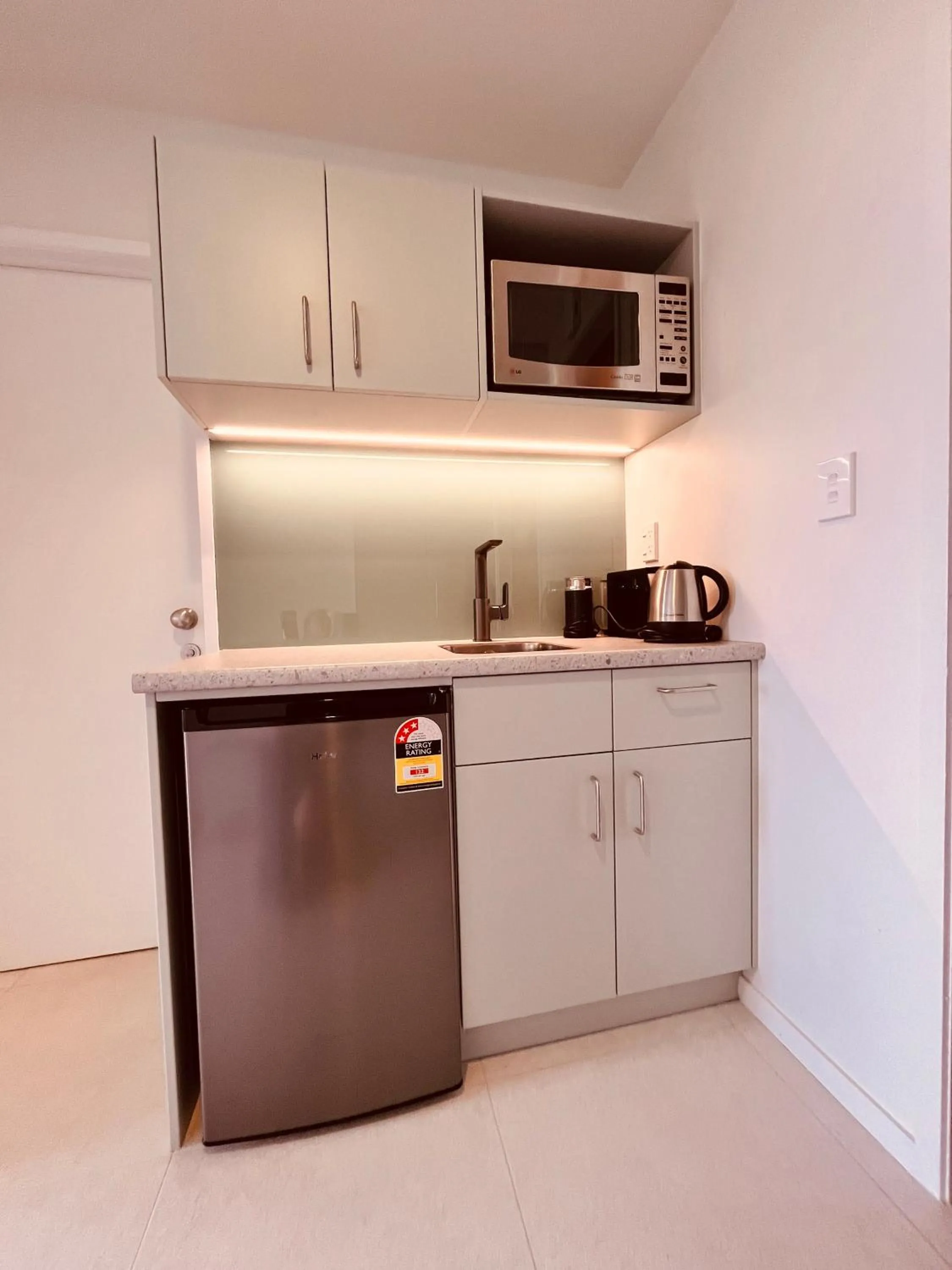 Kitchen or kitchenette in Watermark Apartments