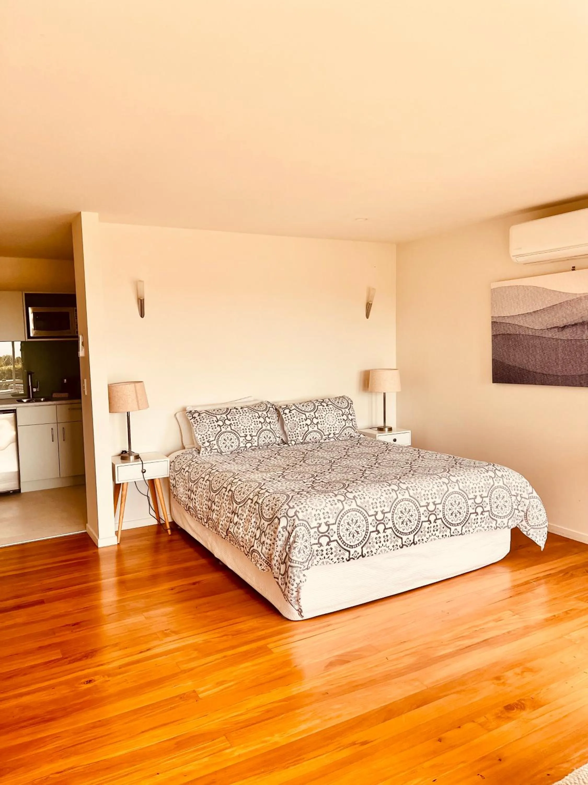 Bed in Watermark Apartments