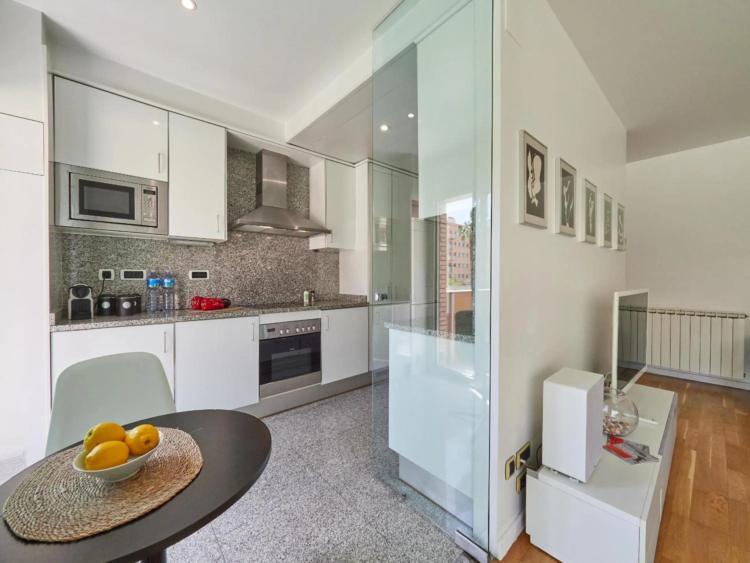 Kitchen or kitchenette in BarcelonaForRent Vila Olimpica Pool Suites
