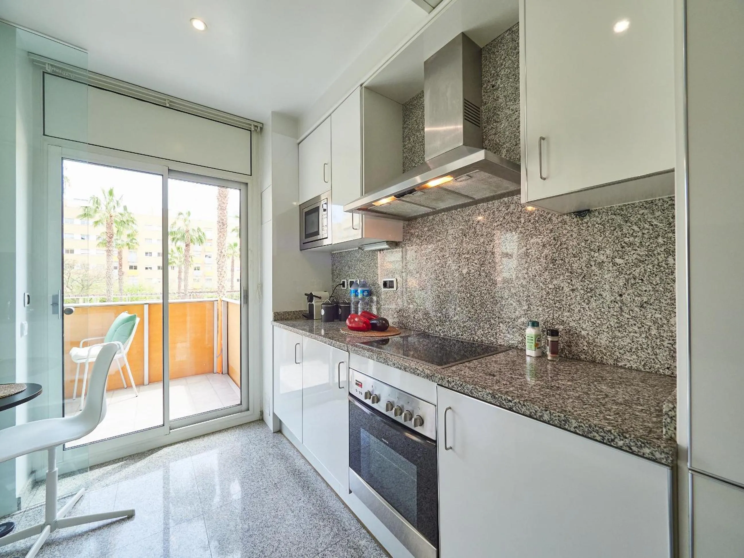 Kitchen or kitchenette in BarcelonaForRent Vila Olimpica Pool Suites