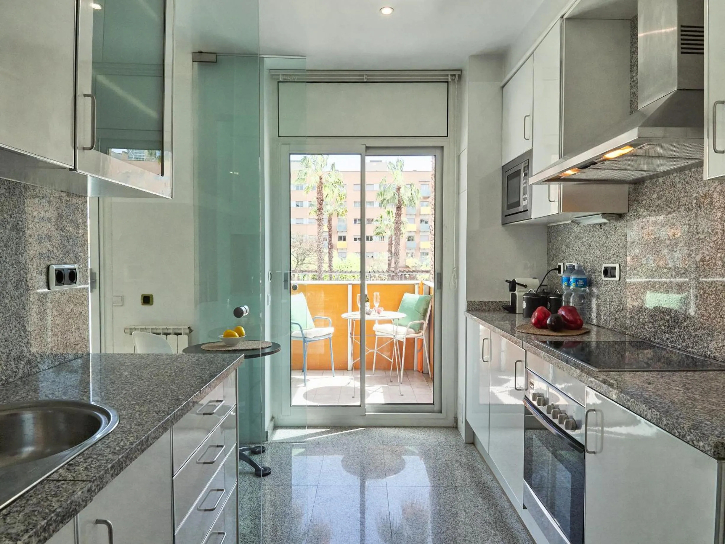 Kitchen or kitchenette in BarcelonaForRent Vila Olimpica Pool Suites