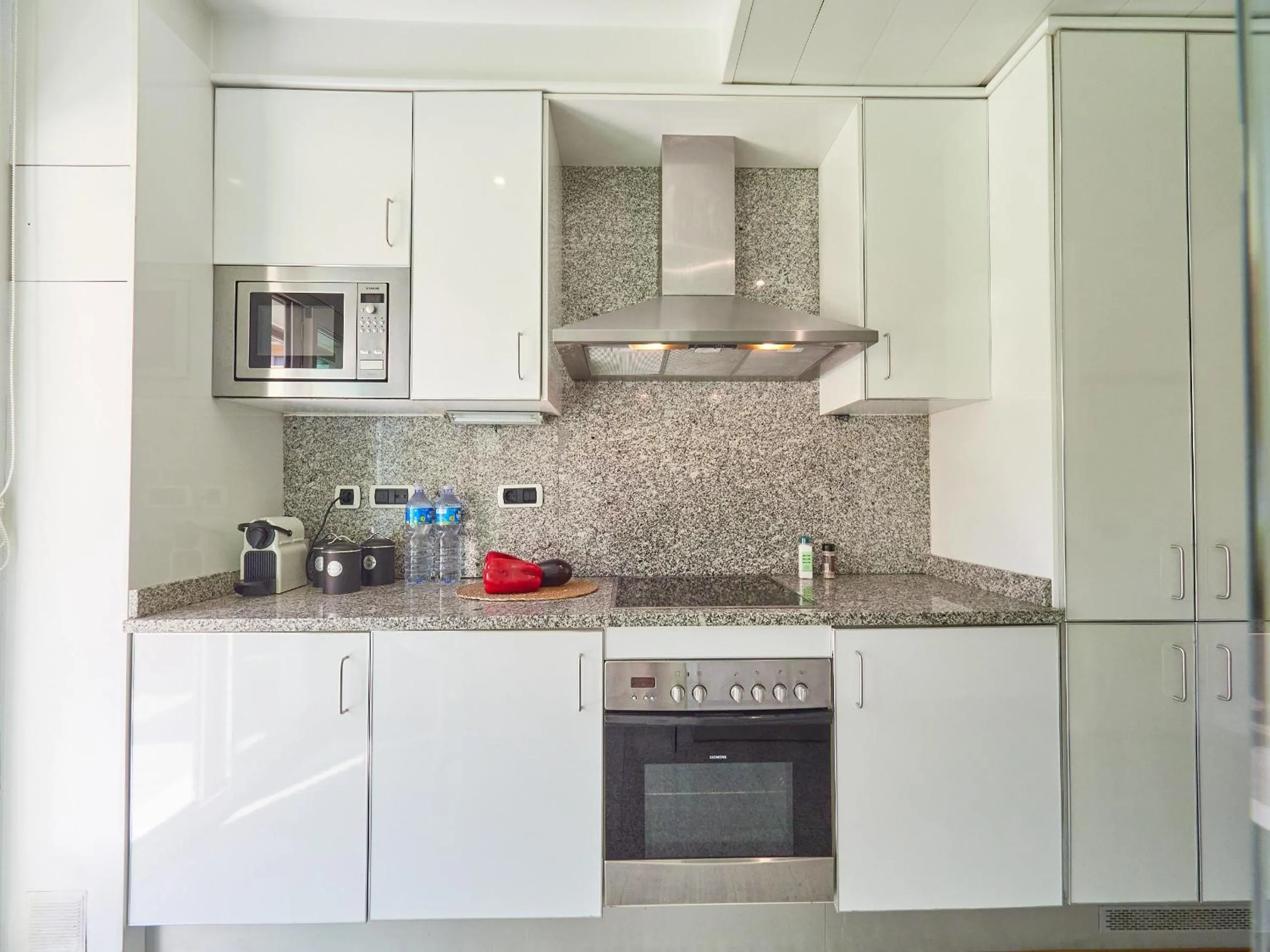 Kitchen or kitchenette in BarcelonaForRent Vila Olimpica Pool Suites