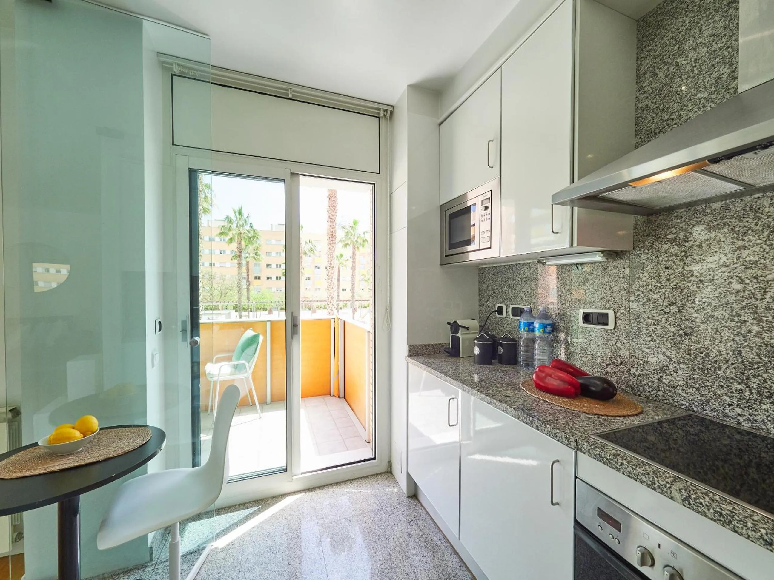 Kitchen or kitchenette in BarcelonaForRent Vila Olimpica Pool Suites