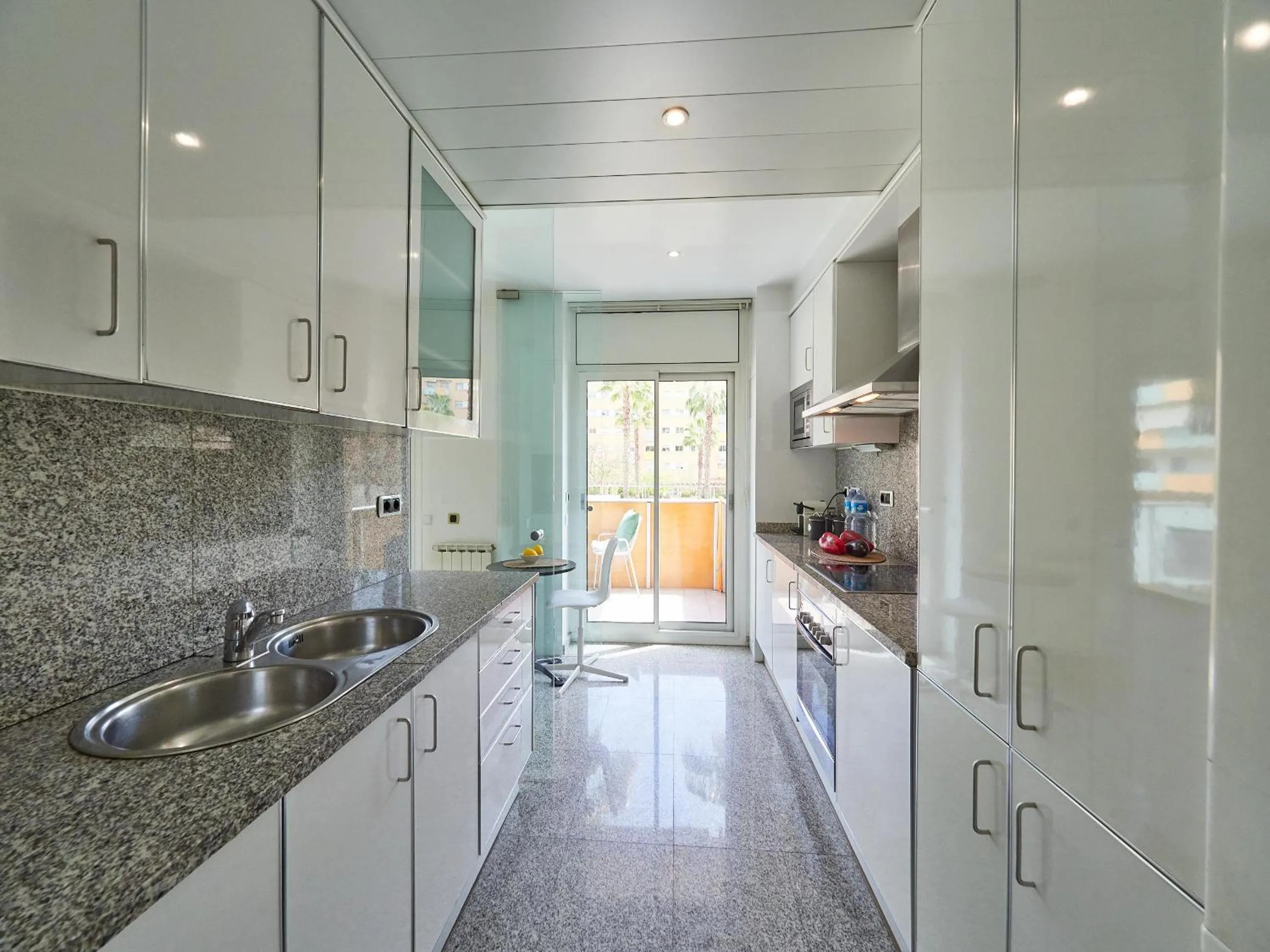 Kitchen or kitchenette in BarcelonaForRent Vila Olimpica Pool Suites