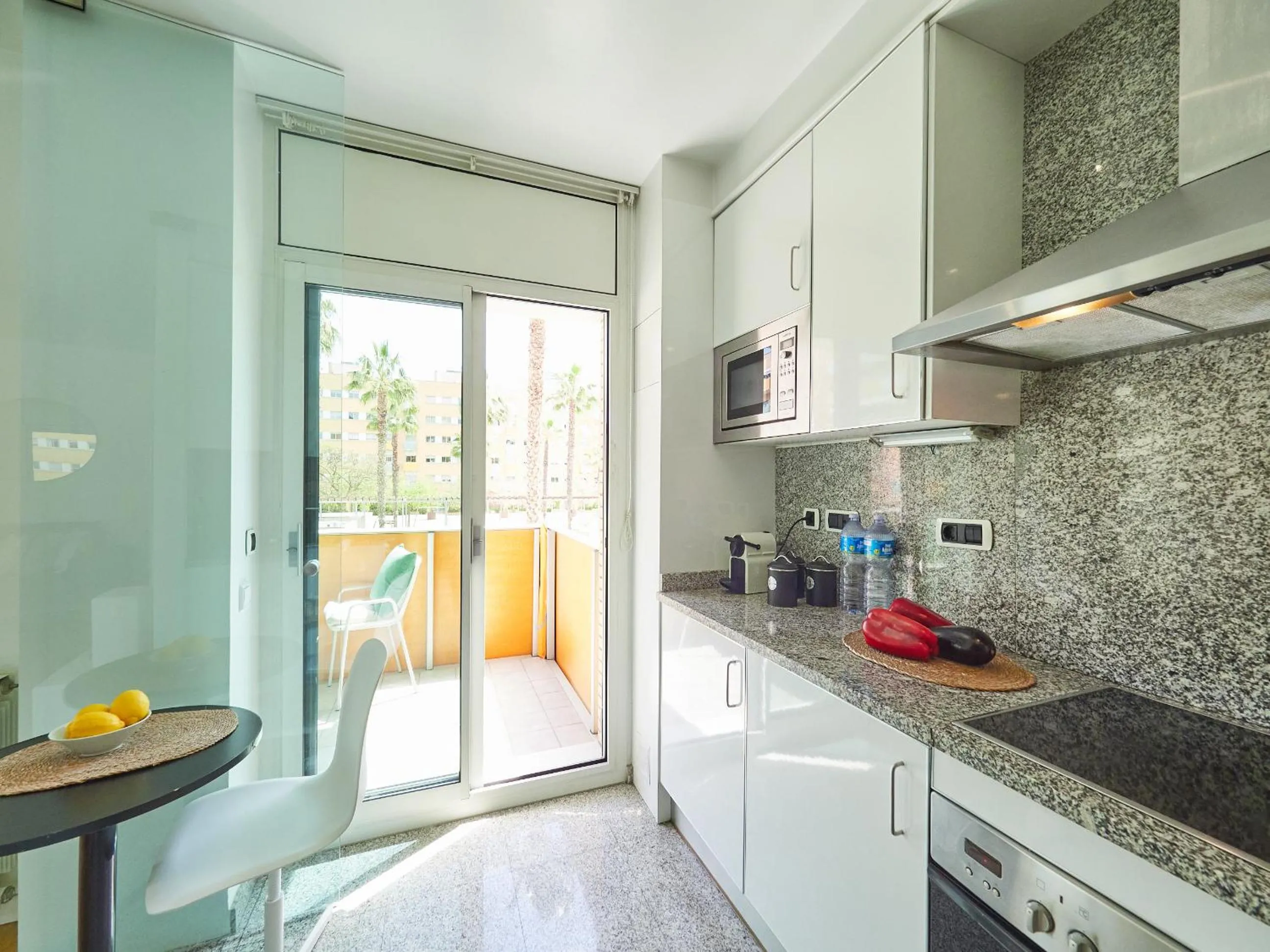 Kitchen or kitchenette in BarcelonaForRent Vila Olimpica Pool Suites