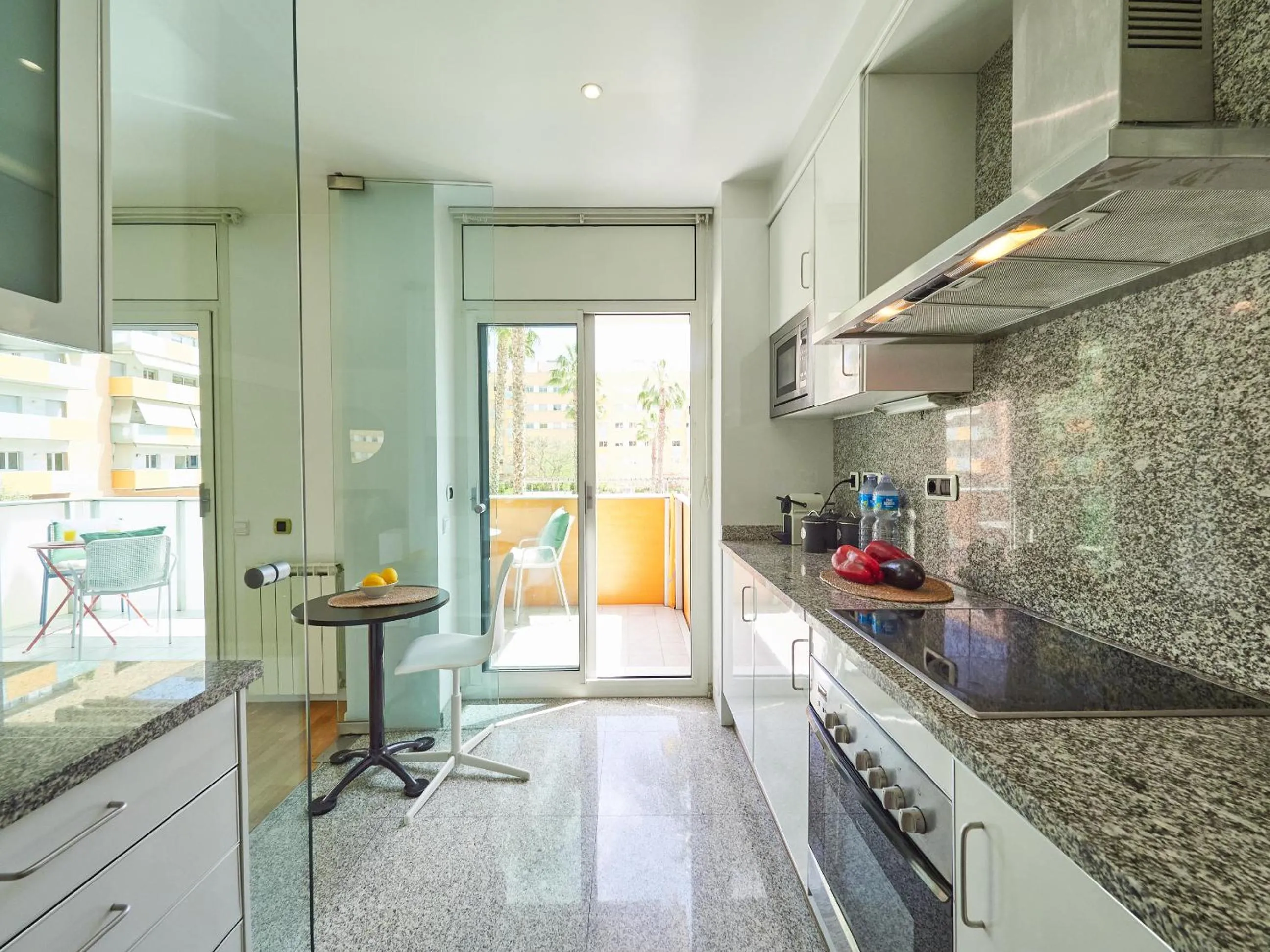 Kitchen or kitchenette in BarcelonaForRent Vila Olimpica Pool Suites