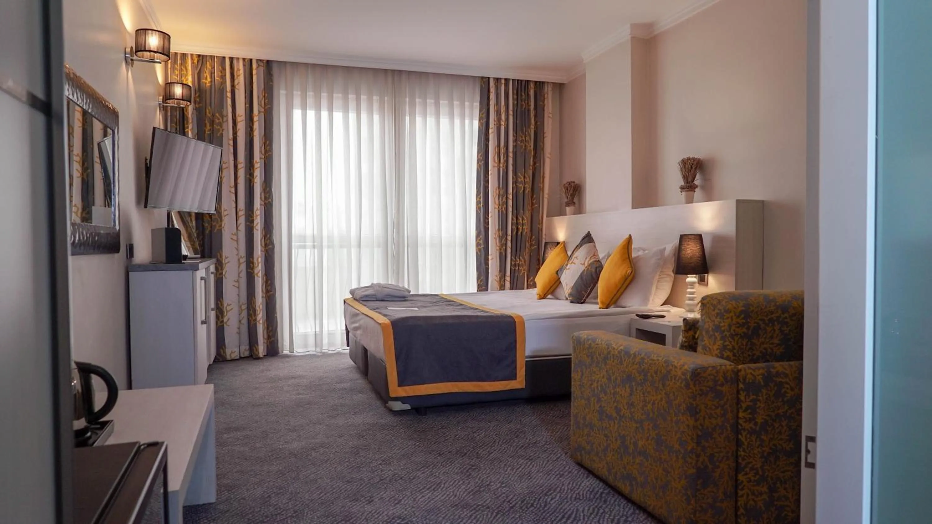 Bedroom in Koza Suite Hotel