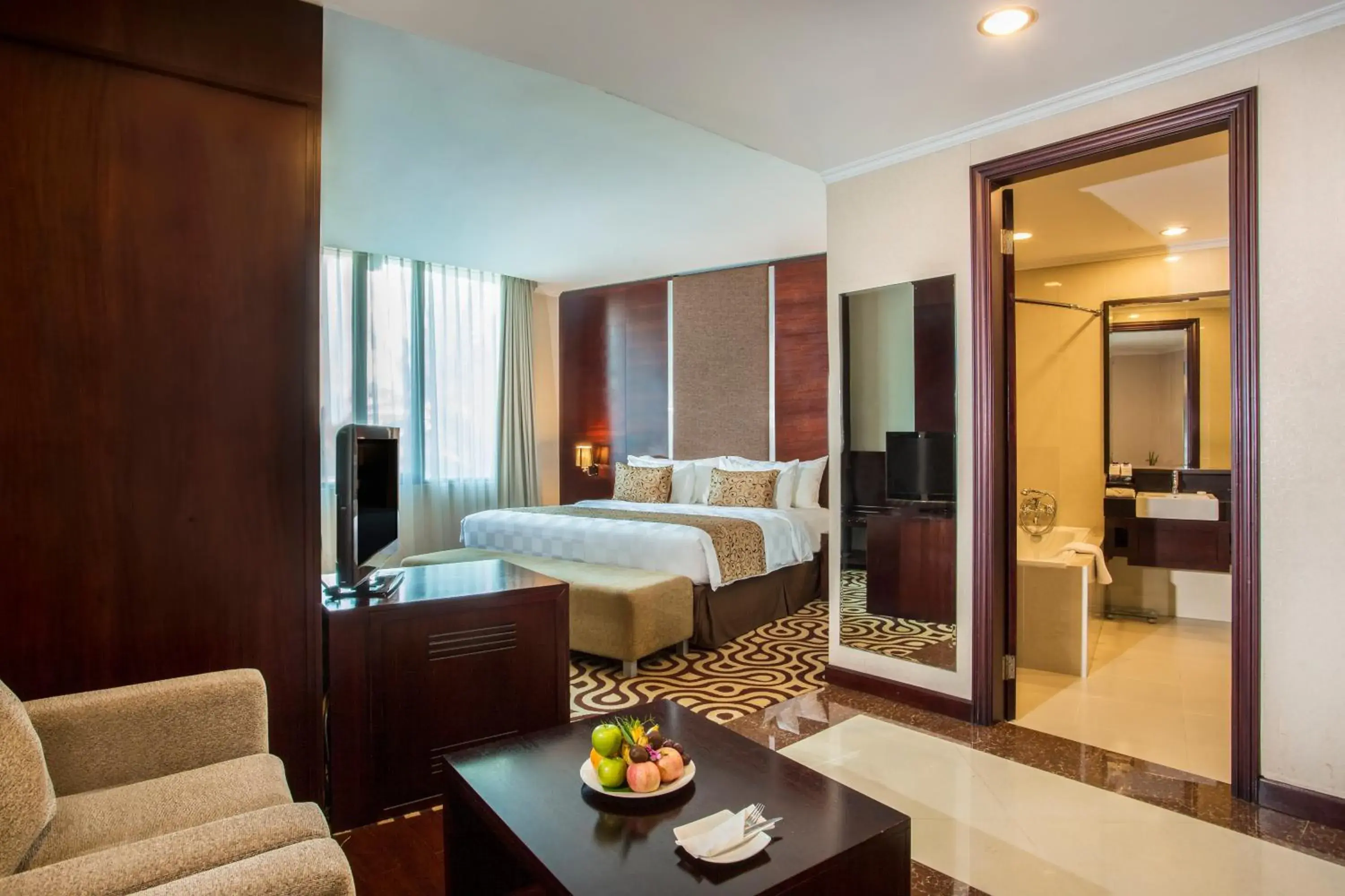 Living room, Bed in Swiss-Belhotel Merauke Living room, Bed in Swiss-Belhotel Merauke