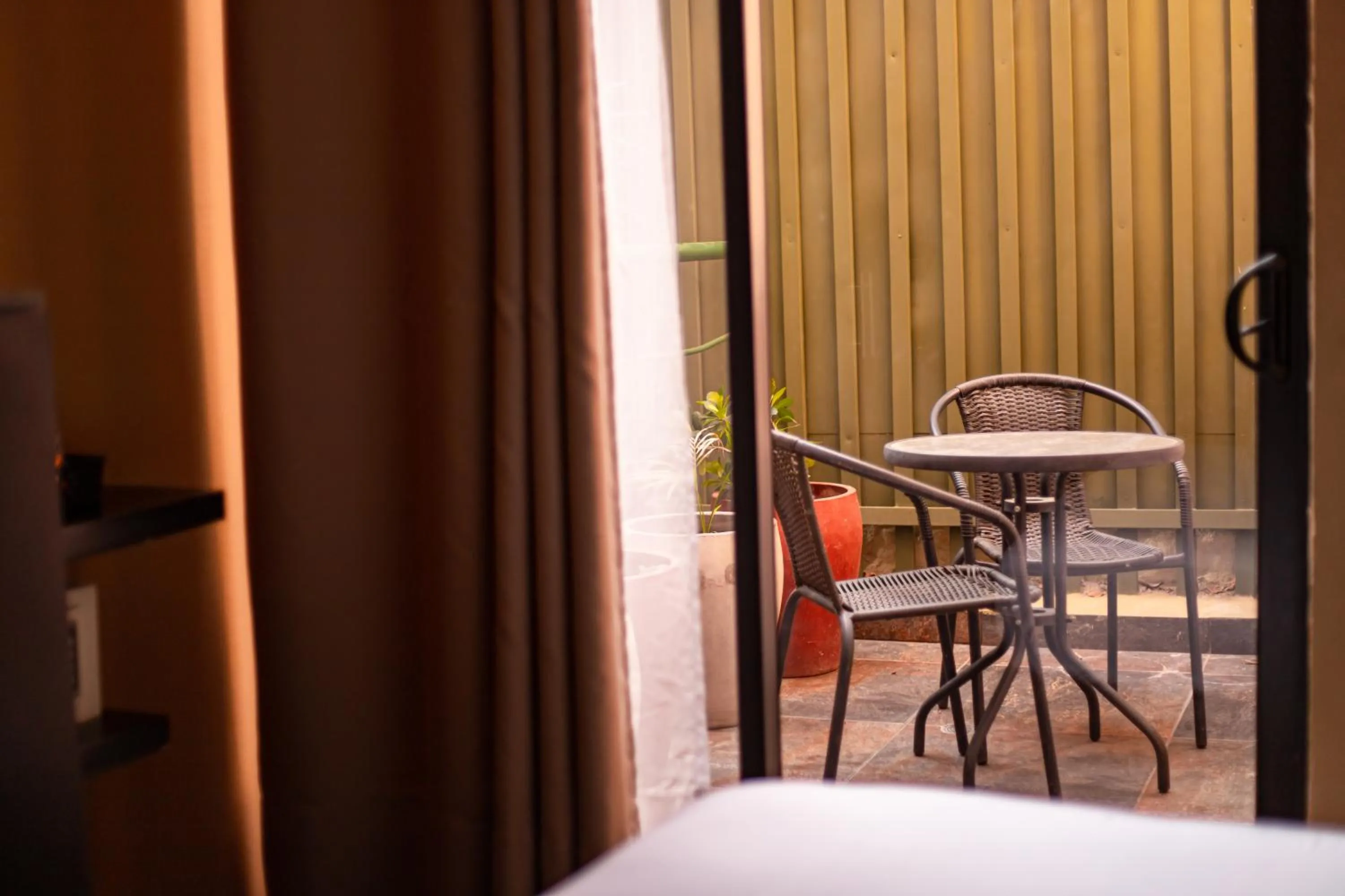 Seating area, Bed in Oasis Fresh Hotel