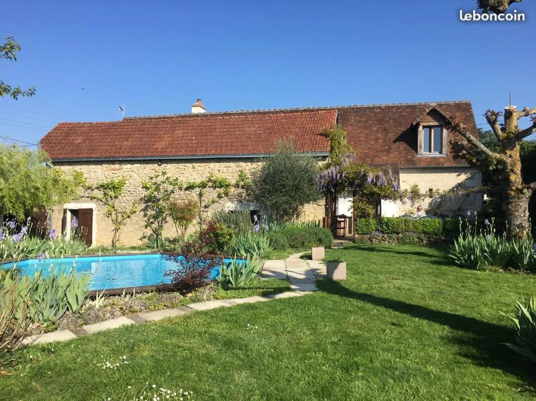 Property building in Chambres d'Hôtes La Vallée des Vignes