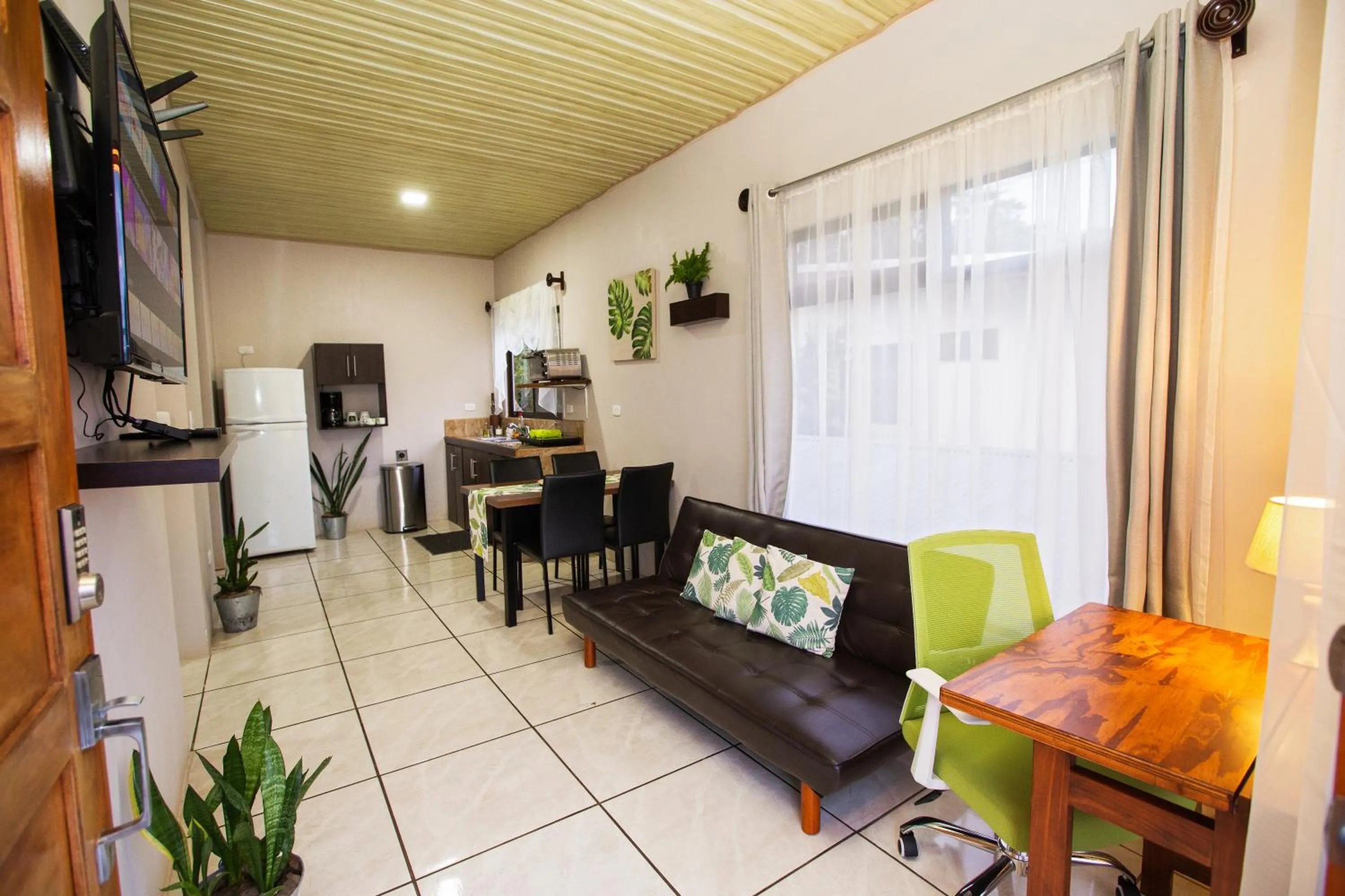 TV and multimedia in Apartamento Lantana ,Monteverde con Aire Acondicionado y Lavanderia