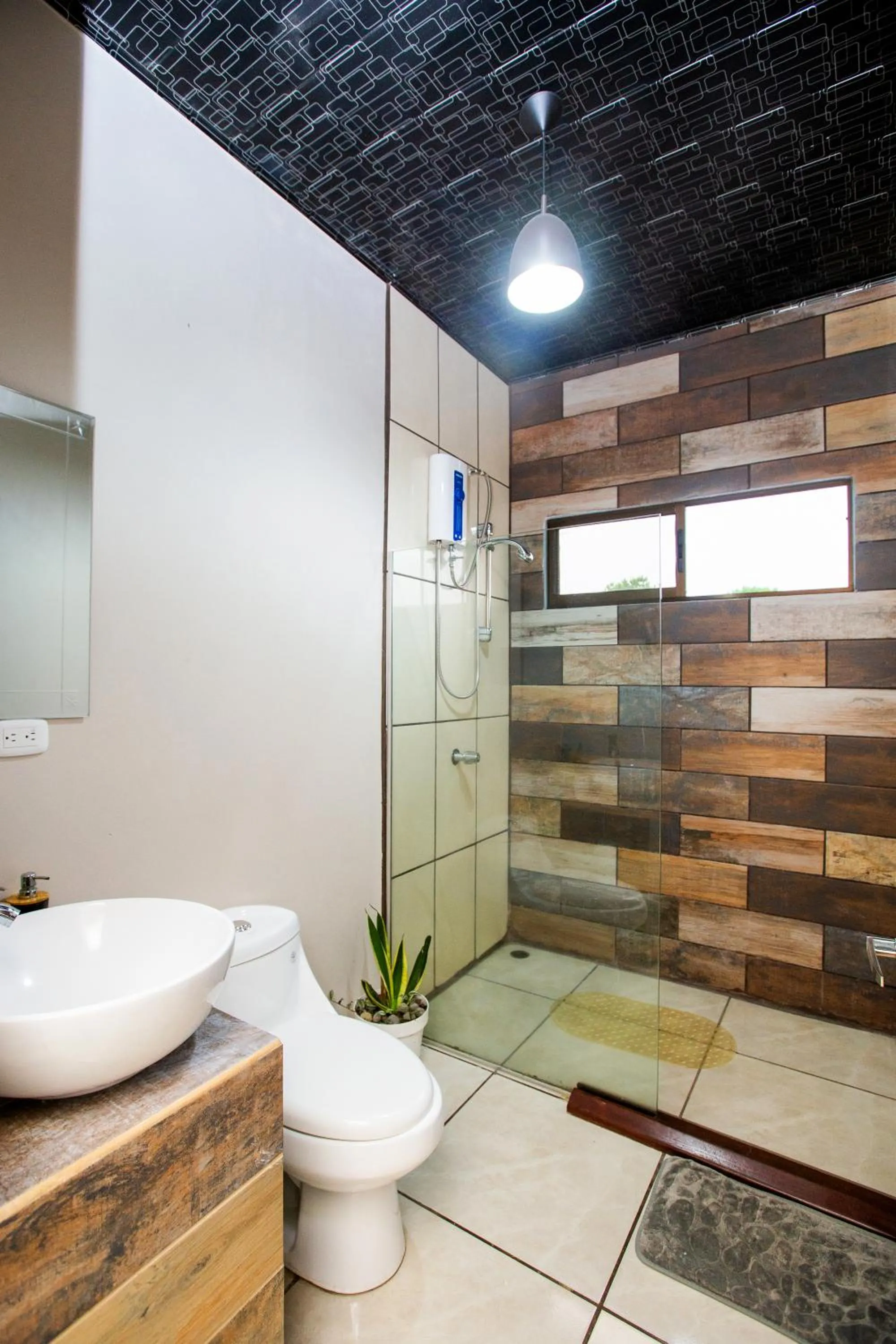 Shower in Apartamento Lantana ,Monteverde con Aire Acondicionado y Lavanderia