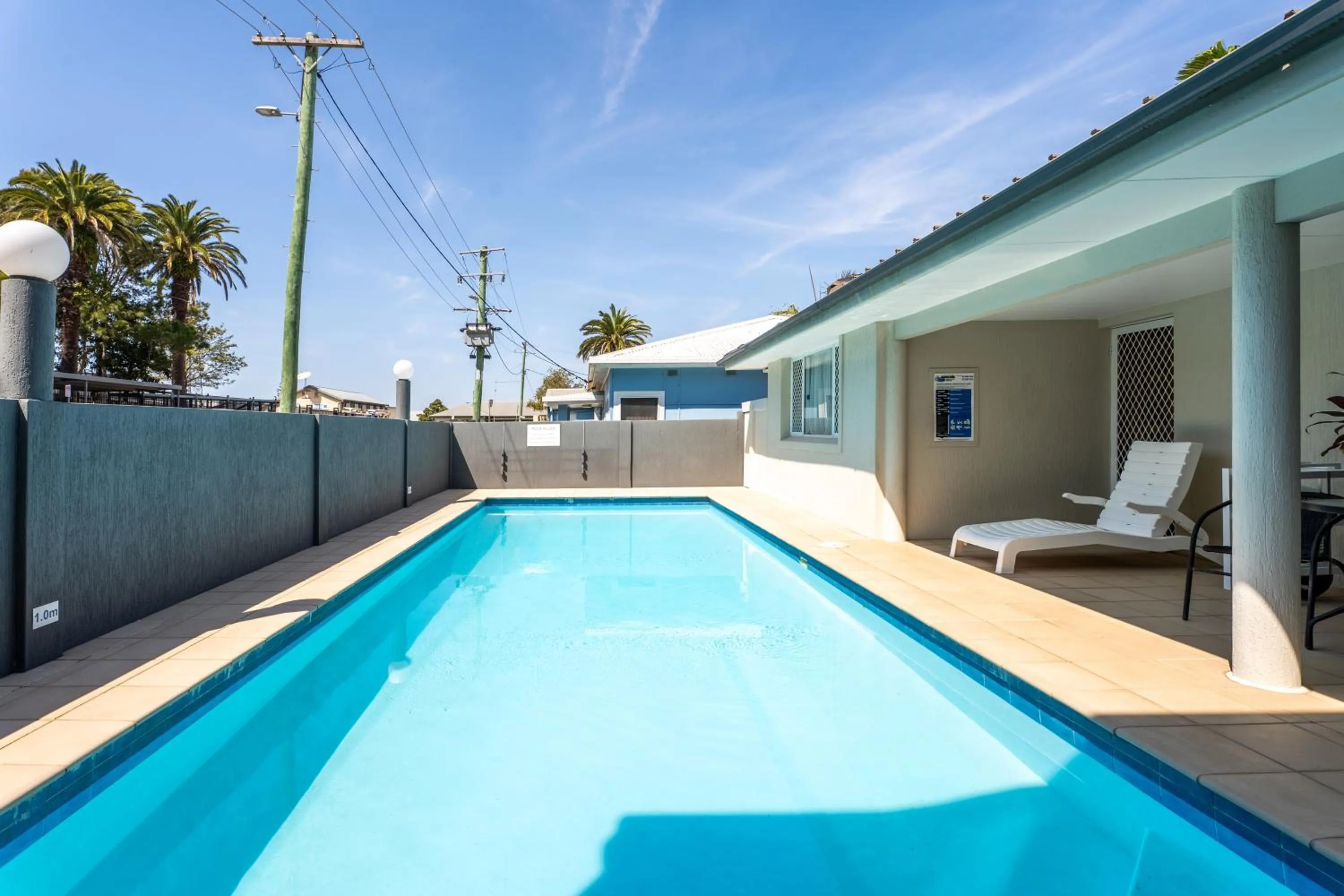Swimming pool in Port Aloha Motel
