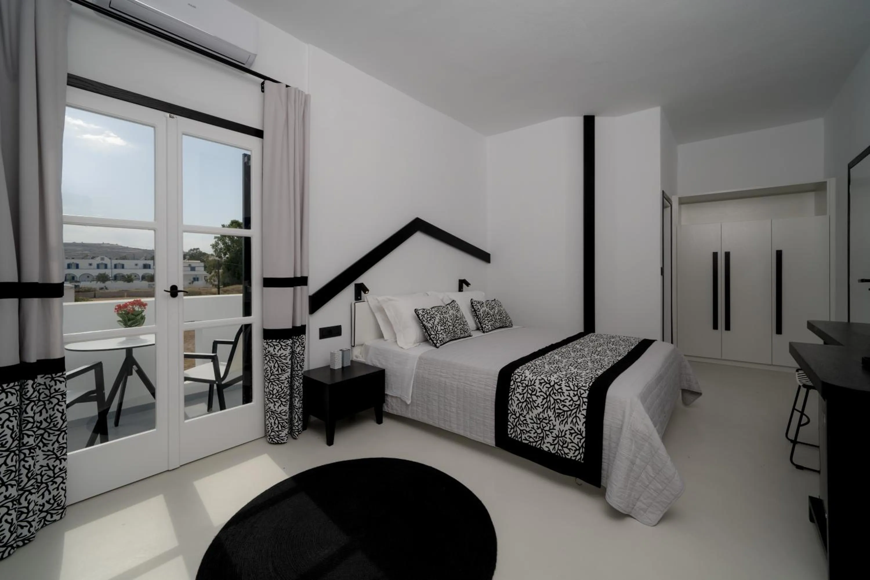 Bed in Divelia Hotel