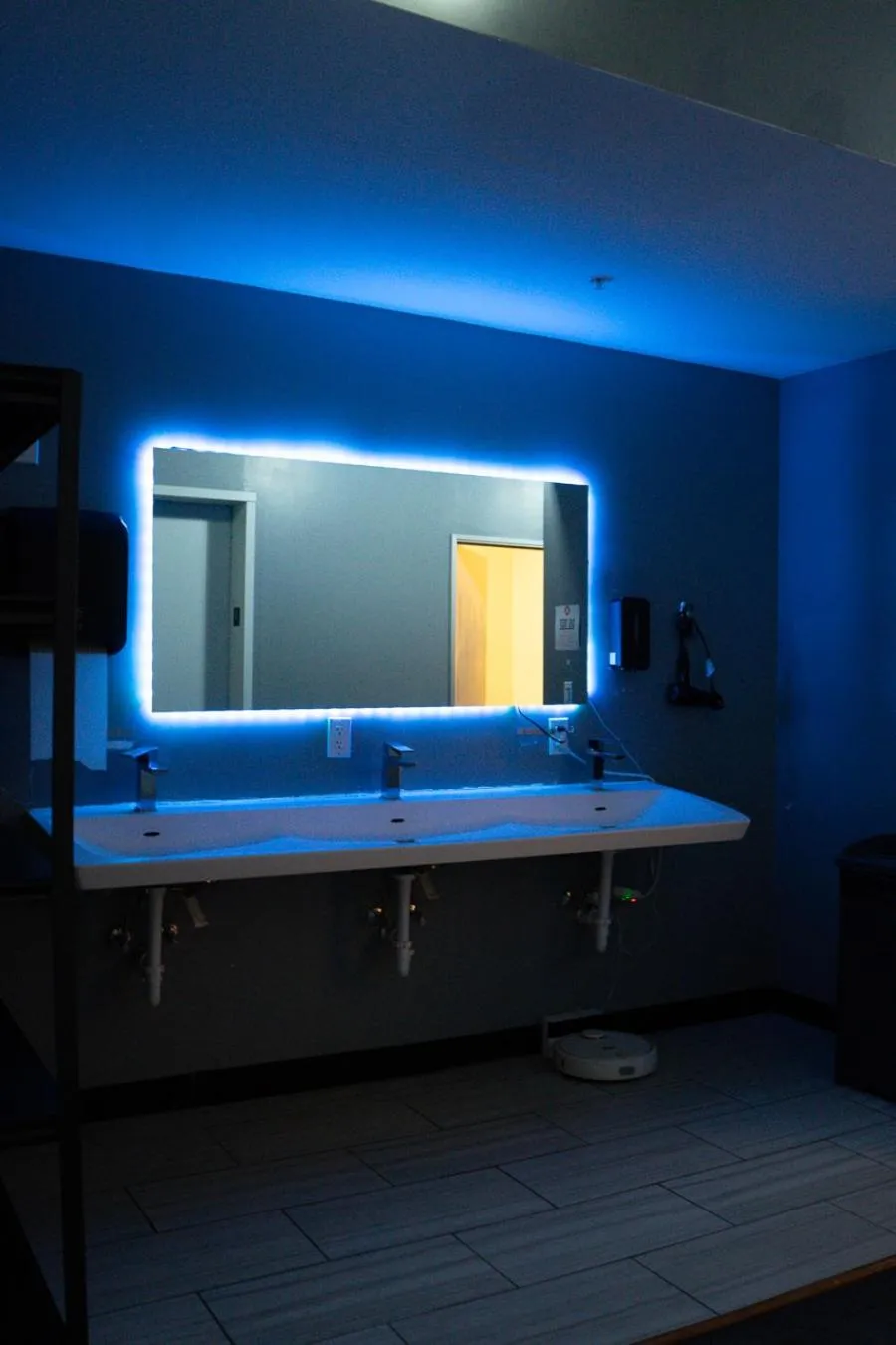 Communal lounge/ TV room in U Street Capsule Hostel