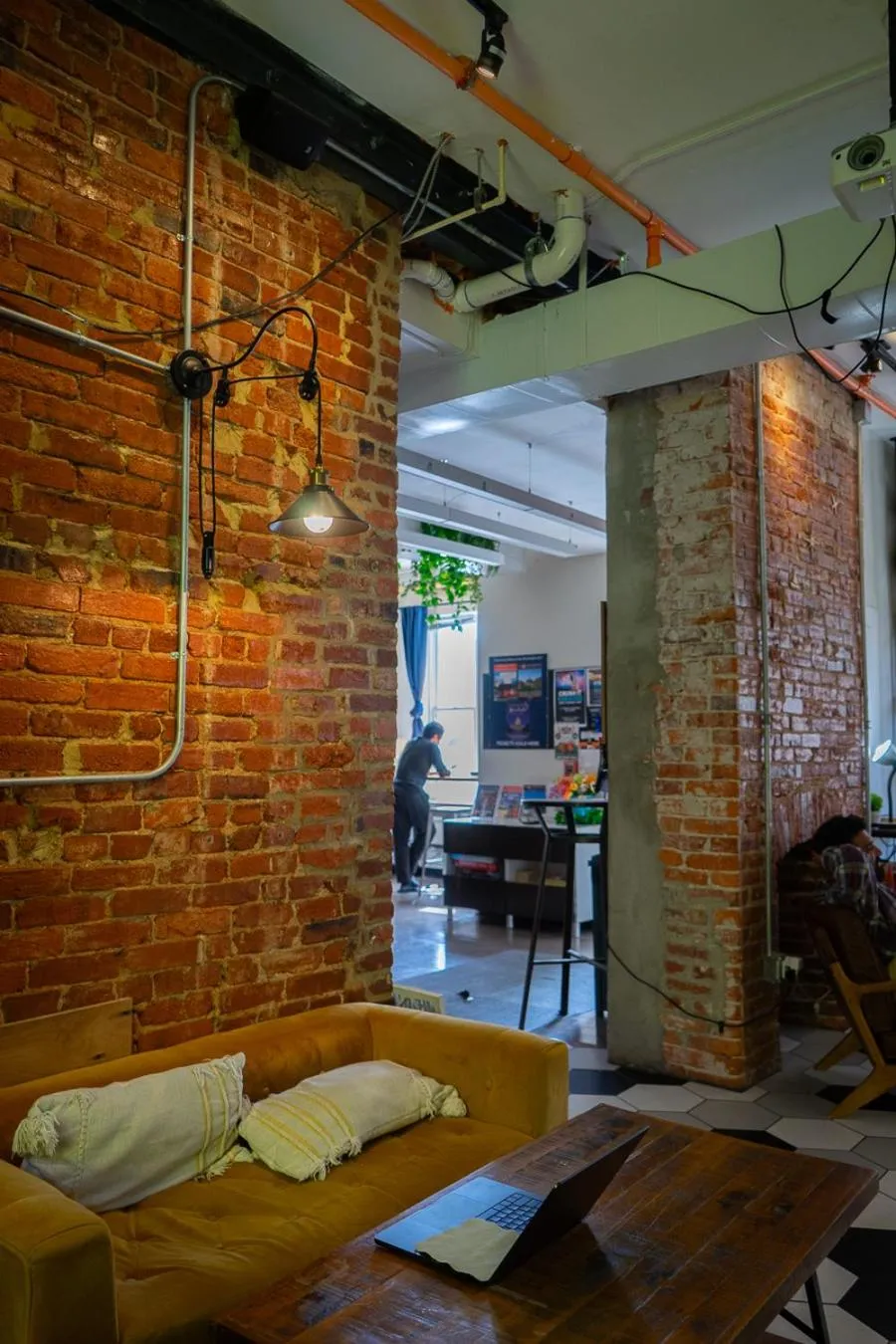 Communal lounge/ TV room in U Street Capsule Hostel