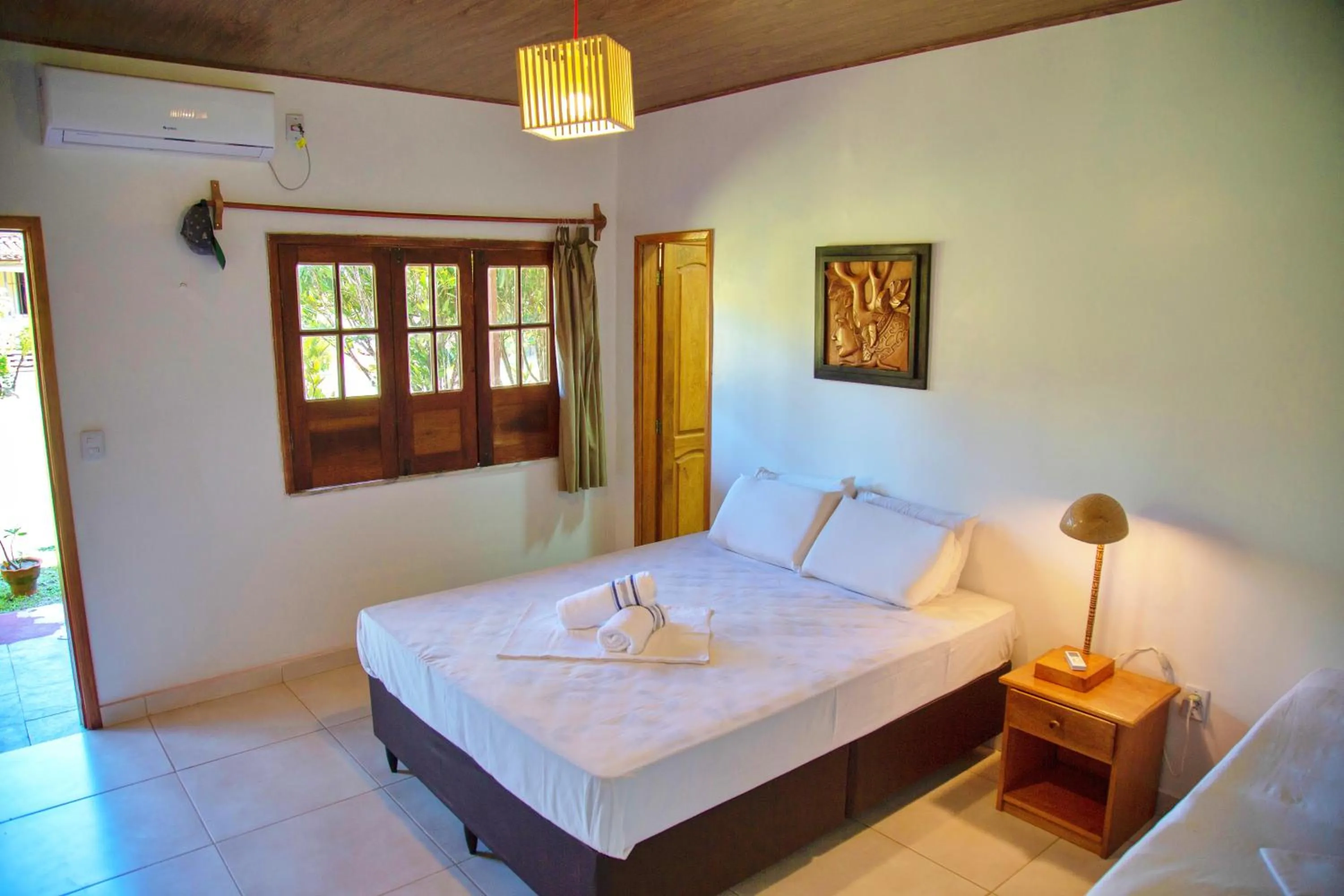 Bed in Pousada O Canto do Francês