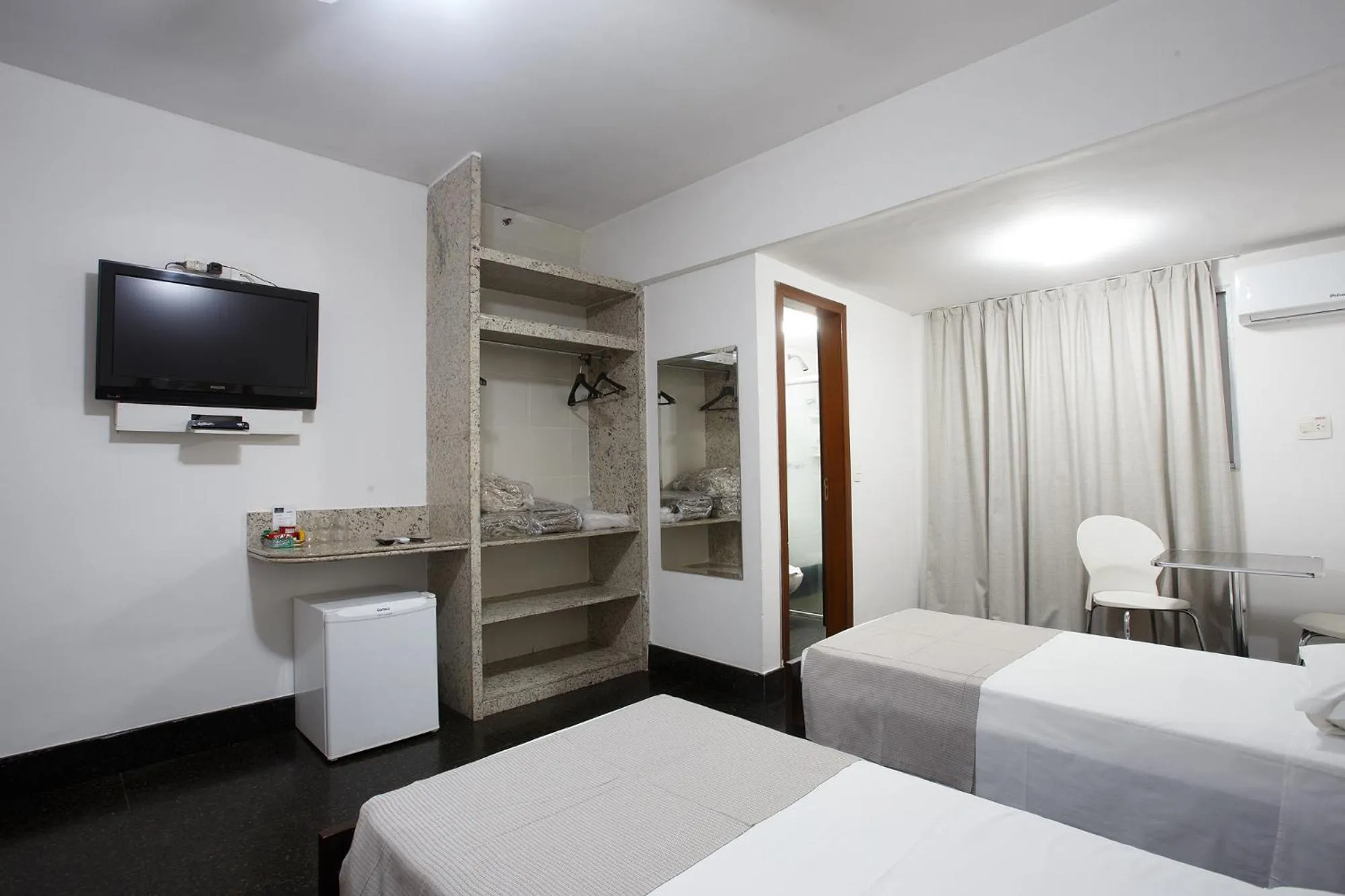 TV and multimedia, Bed in Savassi Hotel