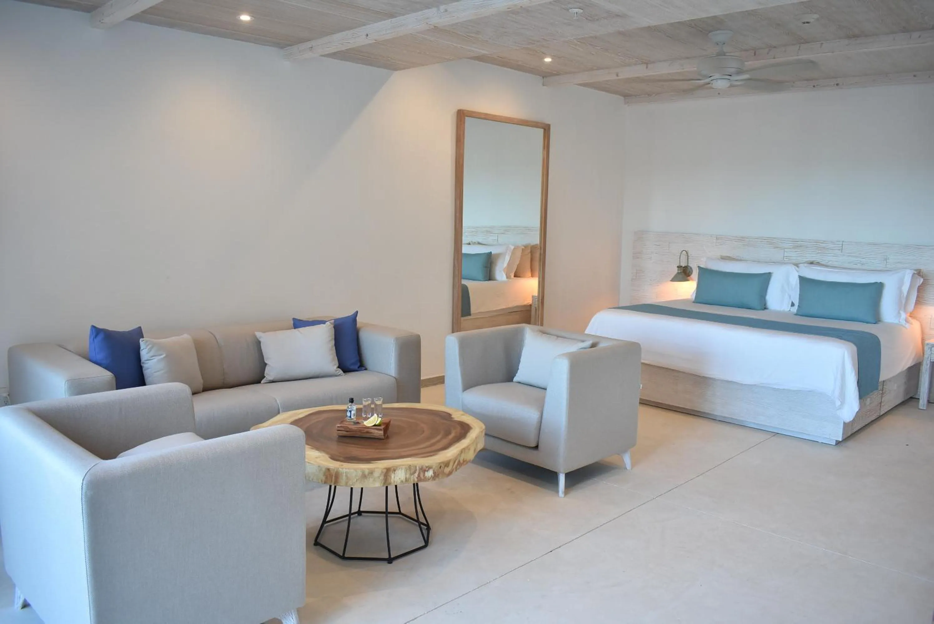 Living room, Bed in Mystique Holbox by Royalton, A Tribute Portfolio Resort