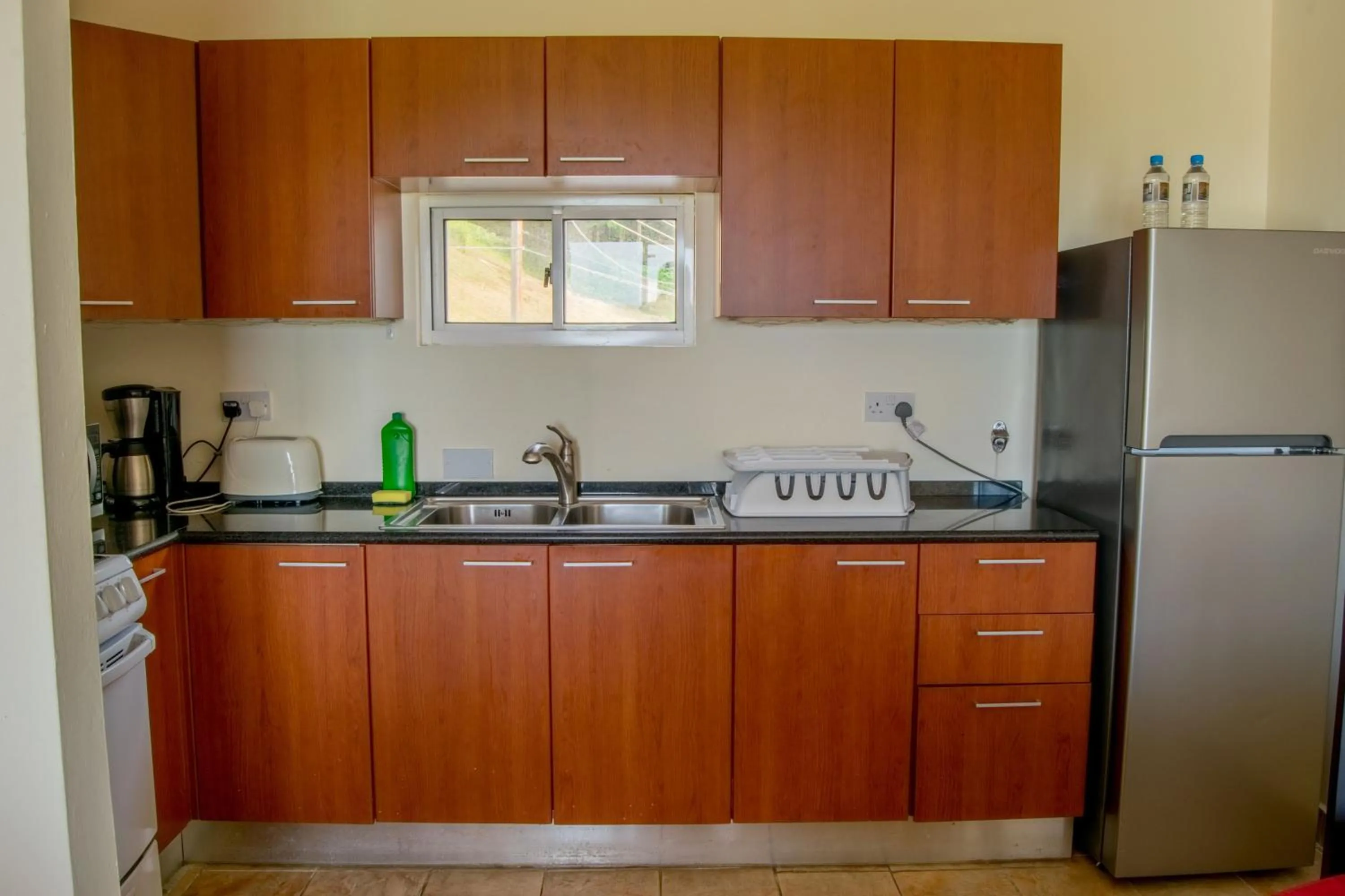 Communal kitchen in Siesta Hotel