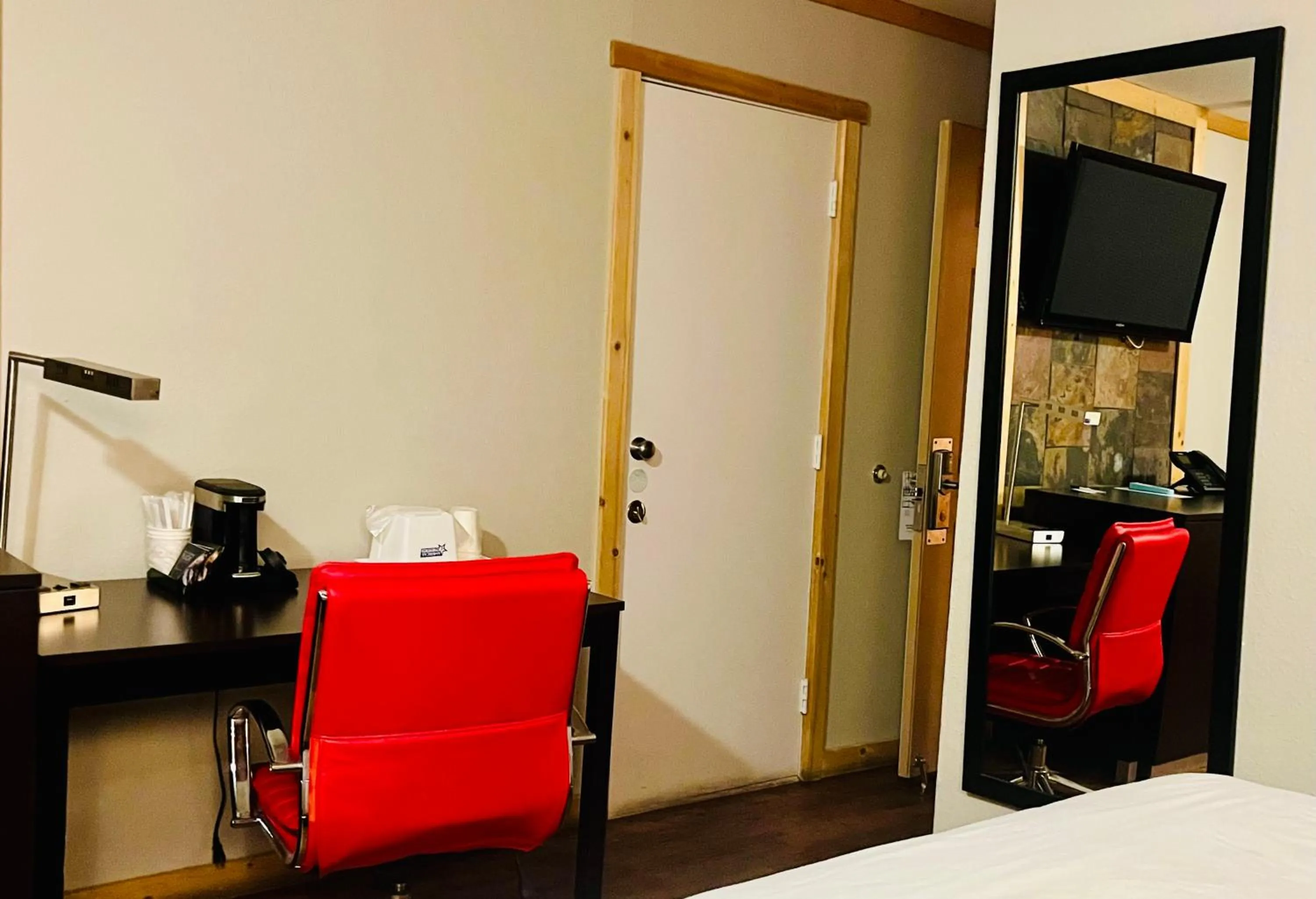 Seating area in Americas Best Value Inn Wall