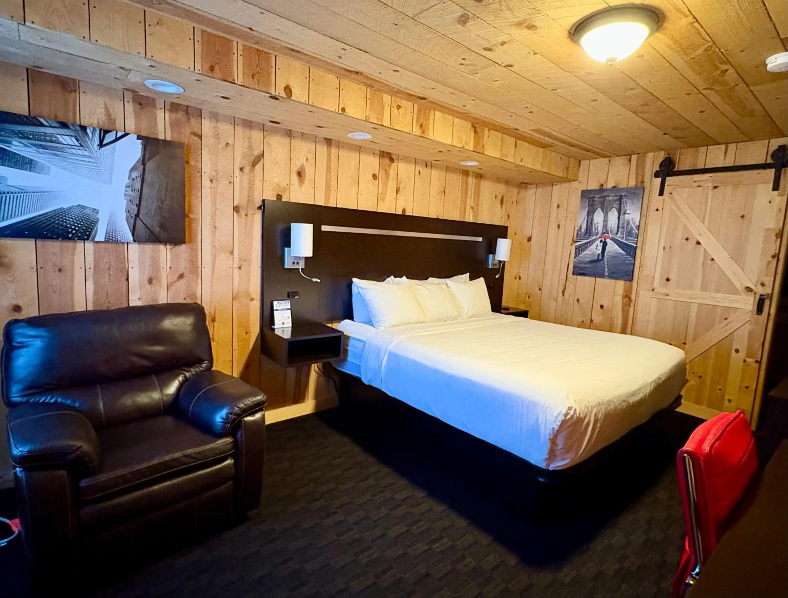 Bed in Americas Best Value Inn Wall