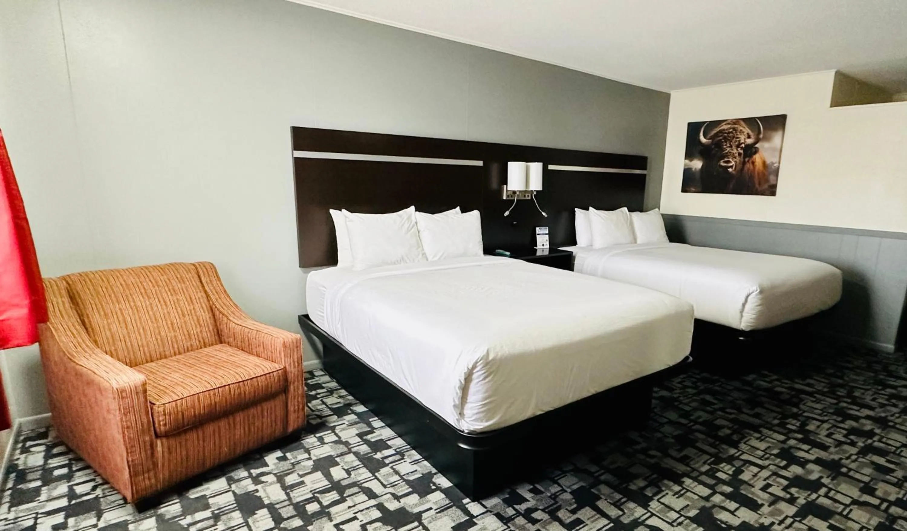 Seating area in Americas Best Value Inn Wall