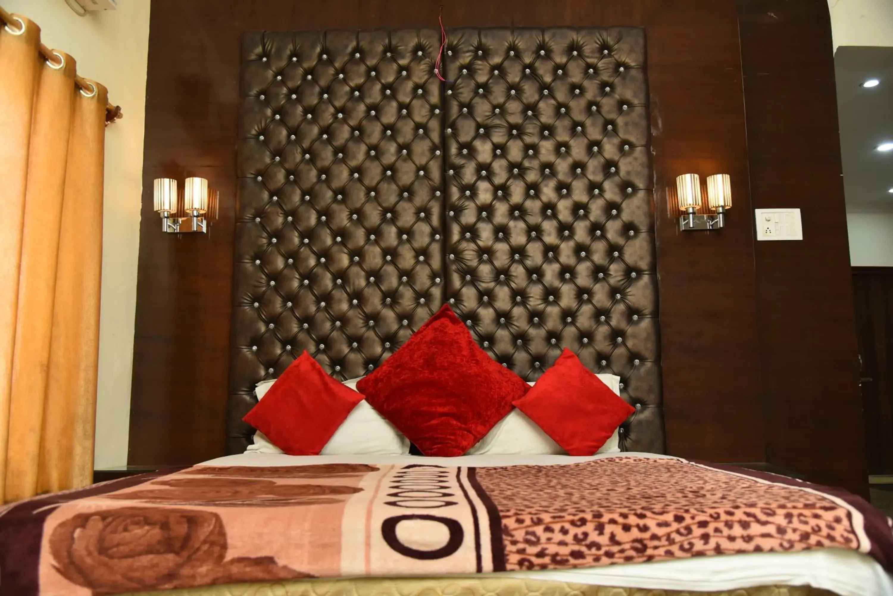 Bed in Hotel Ganga Basin Bed in Hotel Ganga Basin