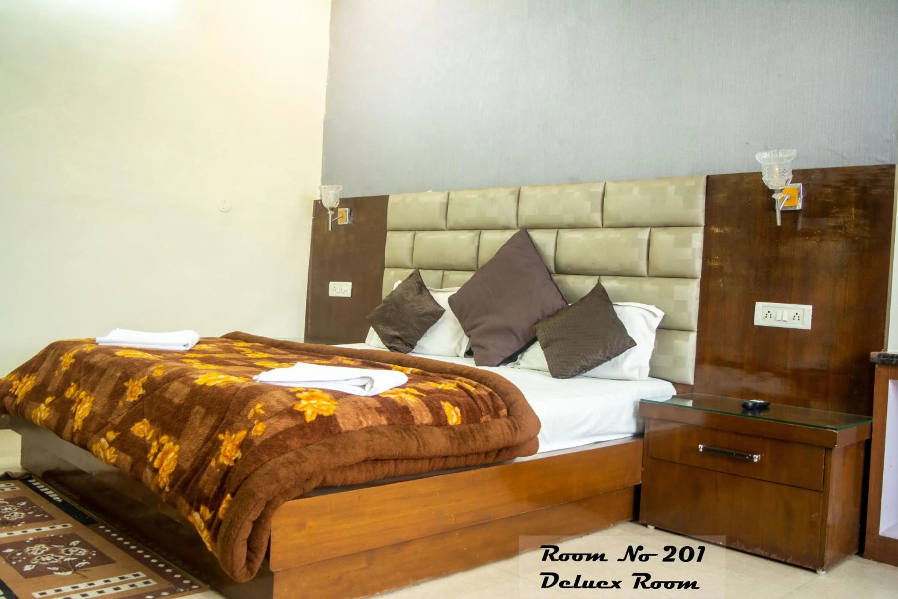 Bed in Hotel Ganga Basin