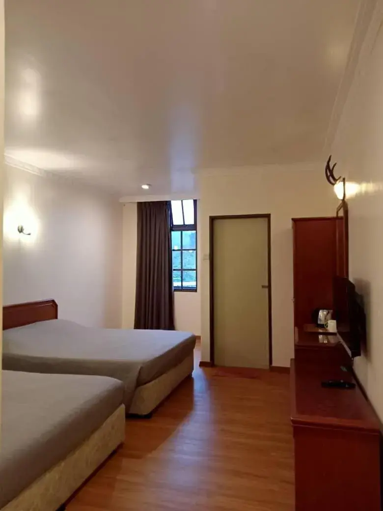 Deluxe Quadruple Room in Hotel Chua Gin Deluxe Quadruple Room in Hotel Chua Gin